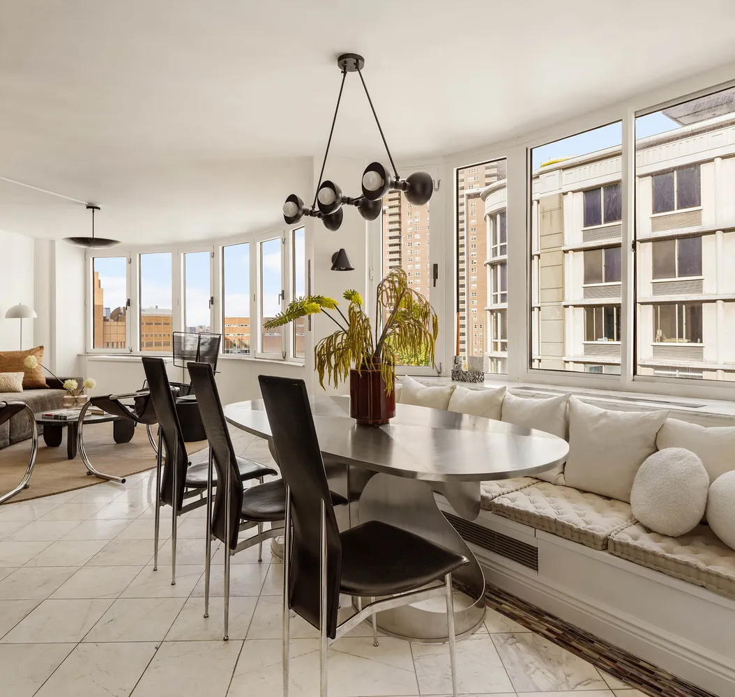 a view of a dining room with furniture