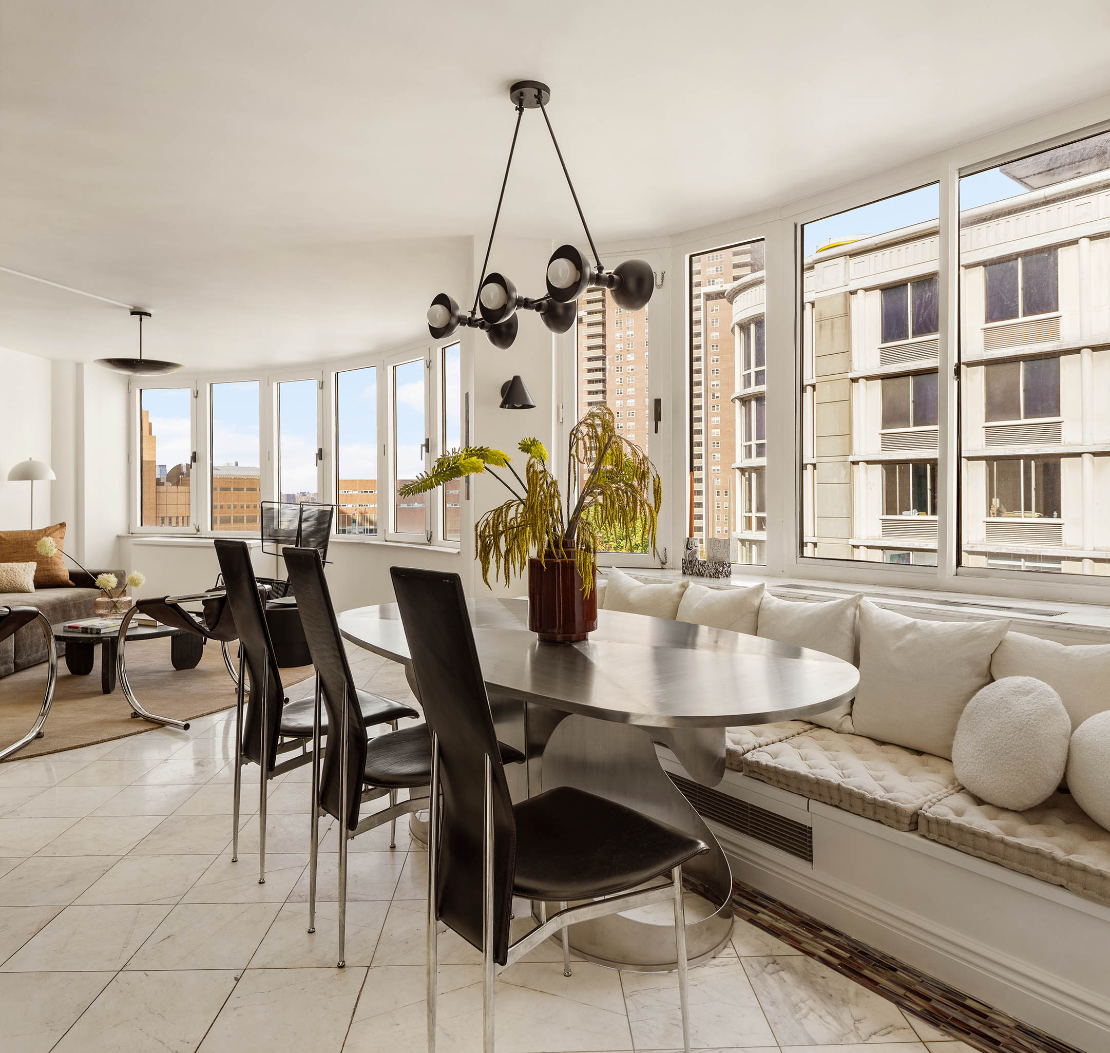 295 Greenwich Street, Unit 8/9H Manhattan, NY 10007 - Photo 4 of 22 a view of a dining room with furniture