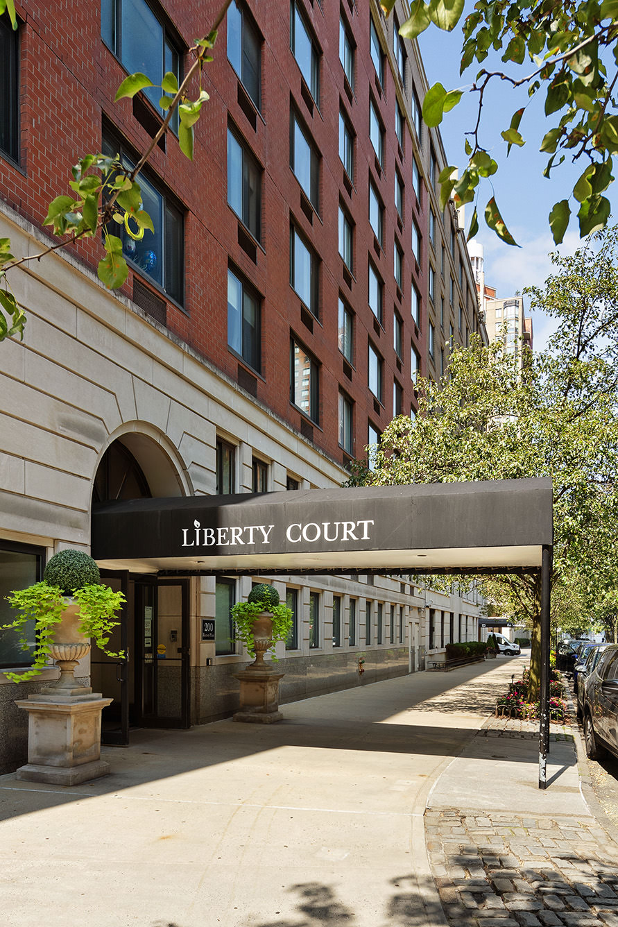200 Rector Place, Unit 36LM Manhattan, NY 10280 - Photo 12 of 15 front view of a building with potted plants