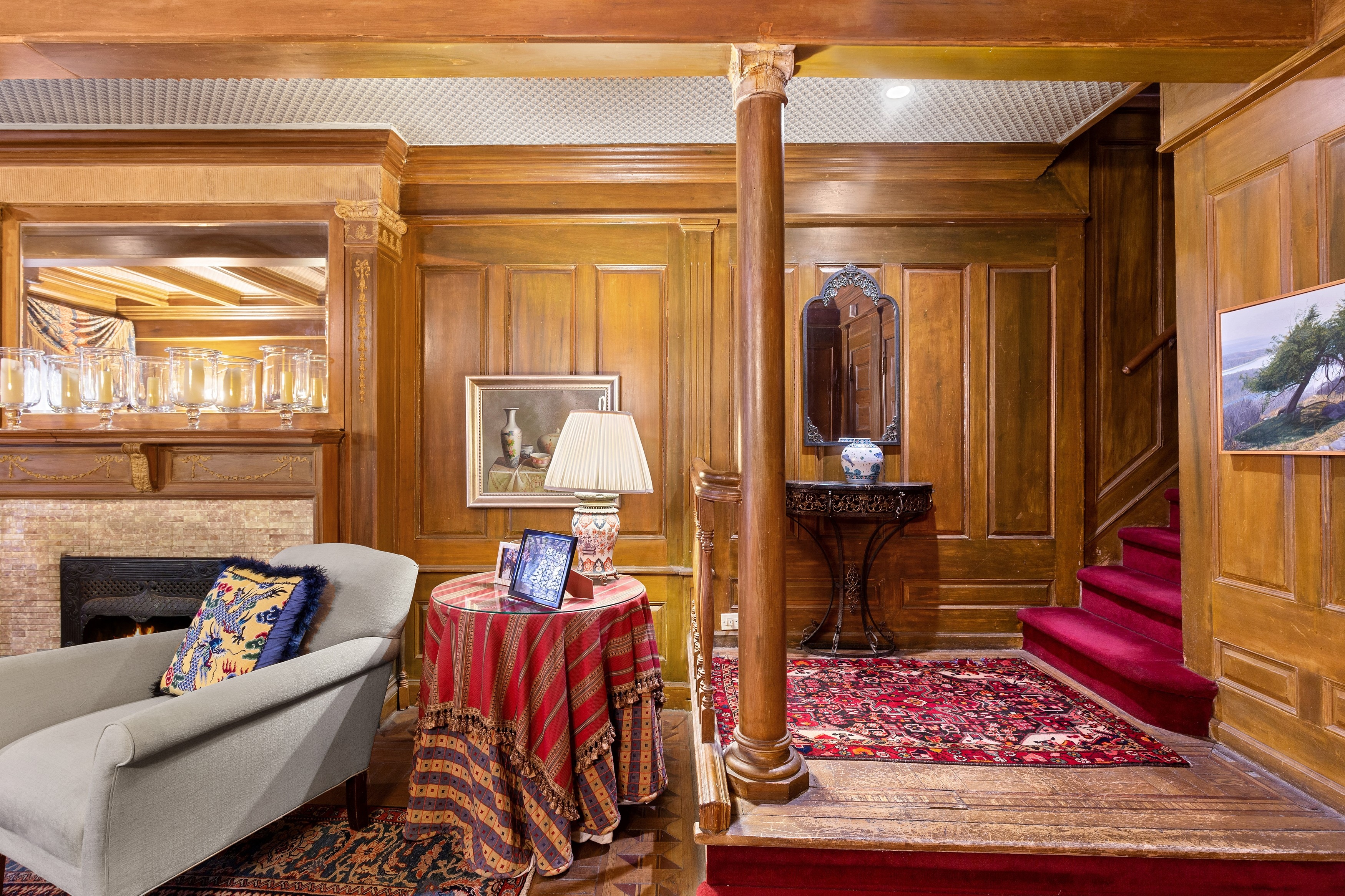 333 West 71st Street Manhattan, NY 10023 - Photo 26 of 29 a living room with a couch and a table