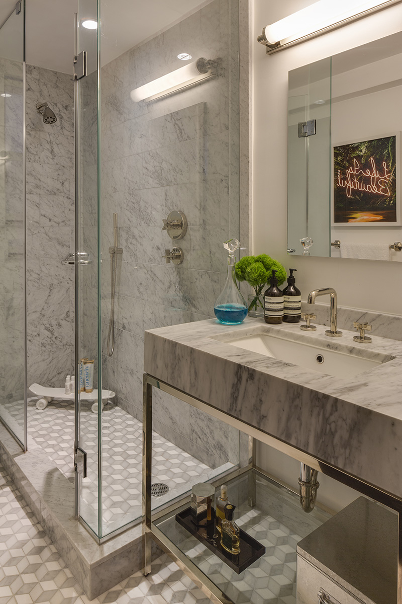 44 Gramercy Park North, Unit 6F Manhattan, NY 10010 - Photo 6 of 13 a bathroom with a sink and a mirror