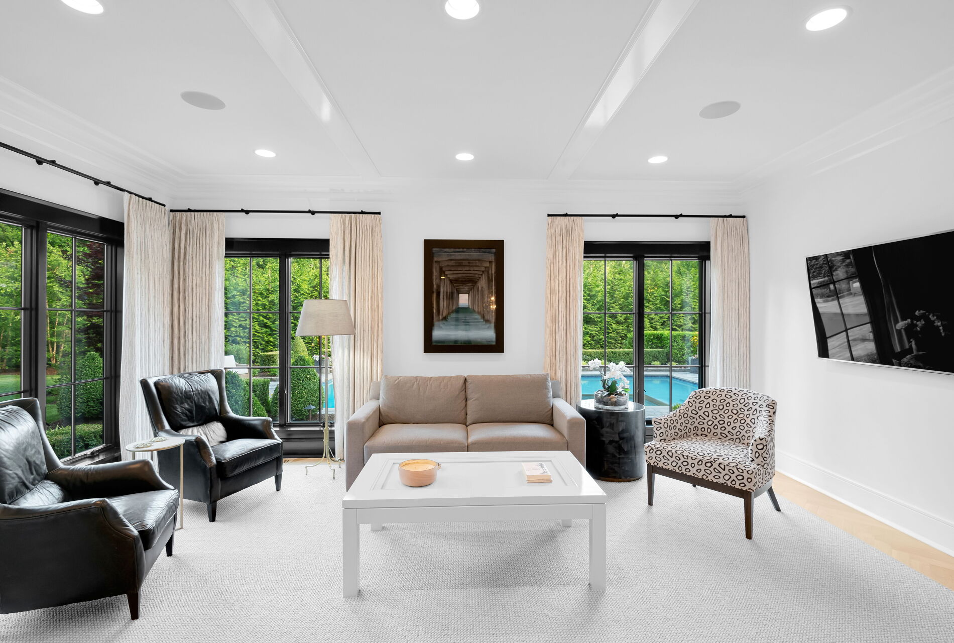 838 Seneca Road Franklin Lakes, NJ 07417 - Photo 20 of 92 a living room with furniture and a flat screen tv
