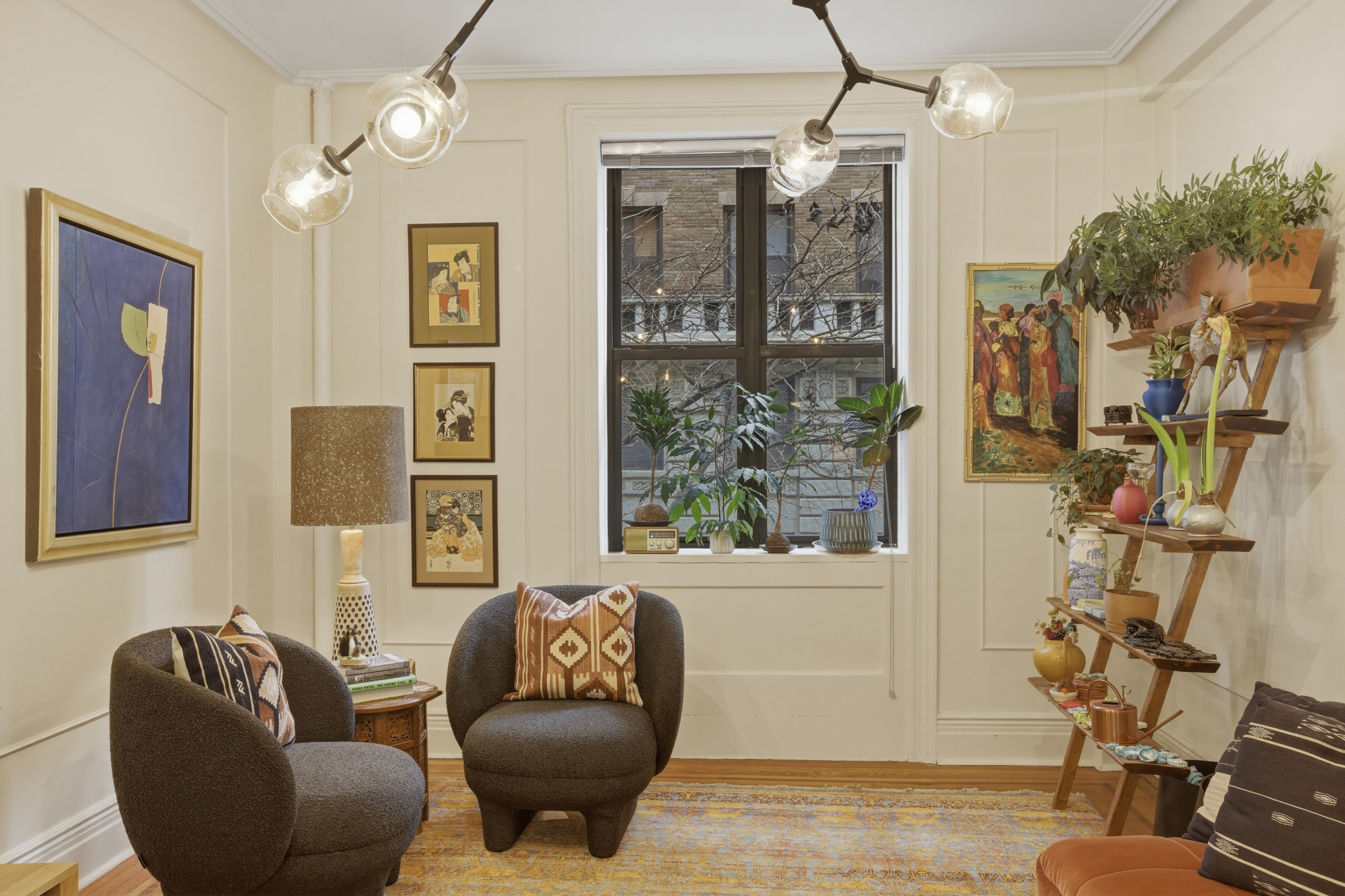 532 West 111th Street, Unit 26 Manhattan, NY 10025 - Photo 2 of 14 a living room with furniture and a window
