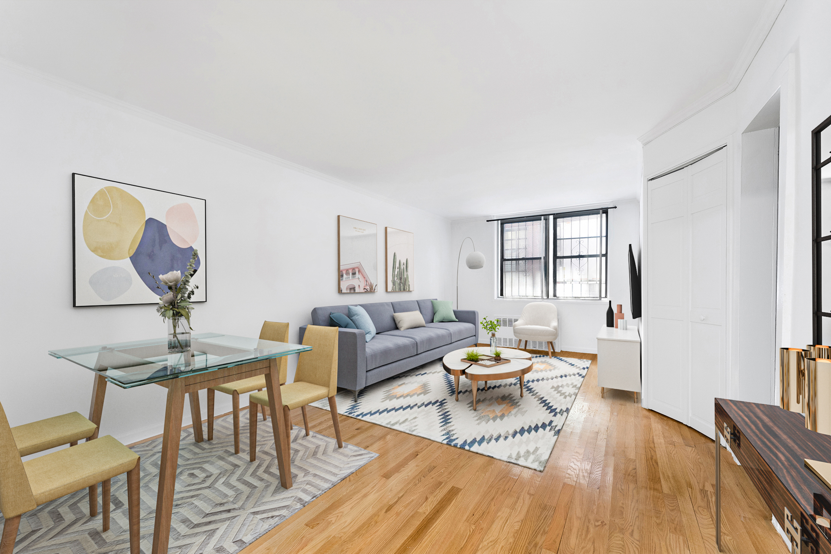 165 Christopher Street, Unit LV Manhattan, NY 10014 - Photo 1 of 16 a living room with furniture and a wooden floor