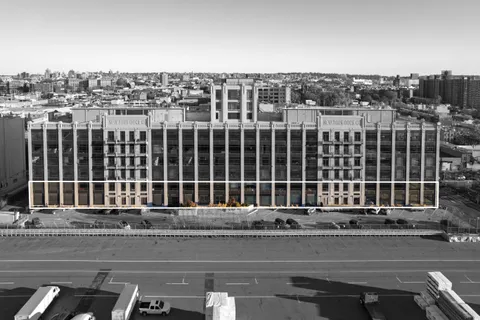 a view of a balcony with a street