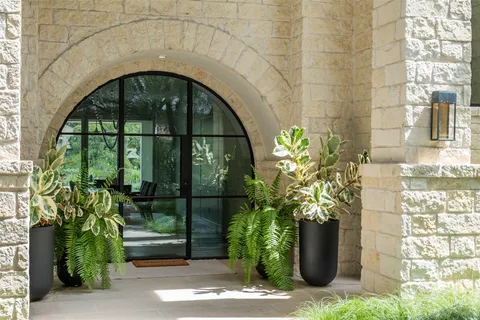 a potted plant sitting in front of a building