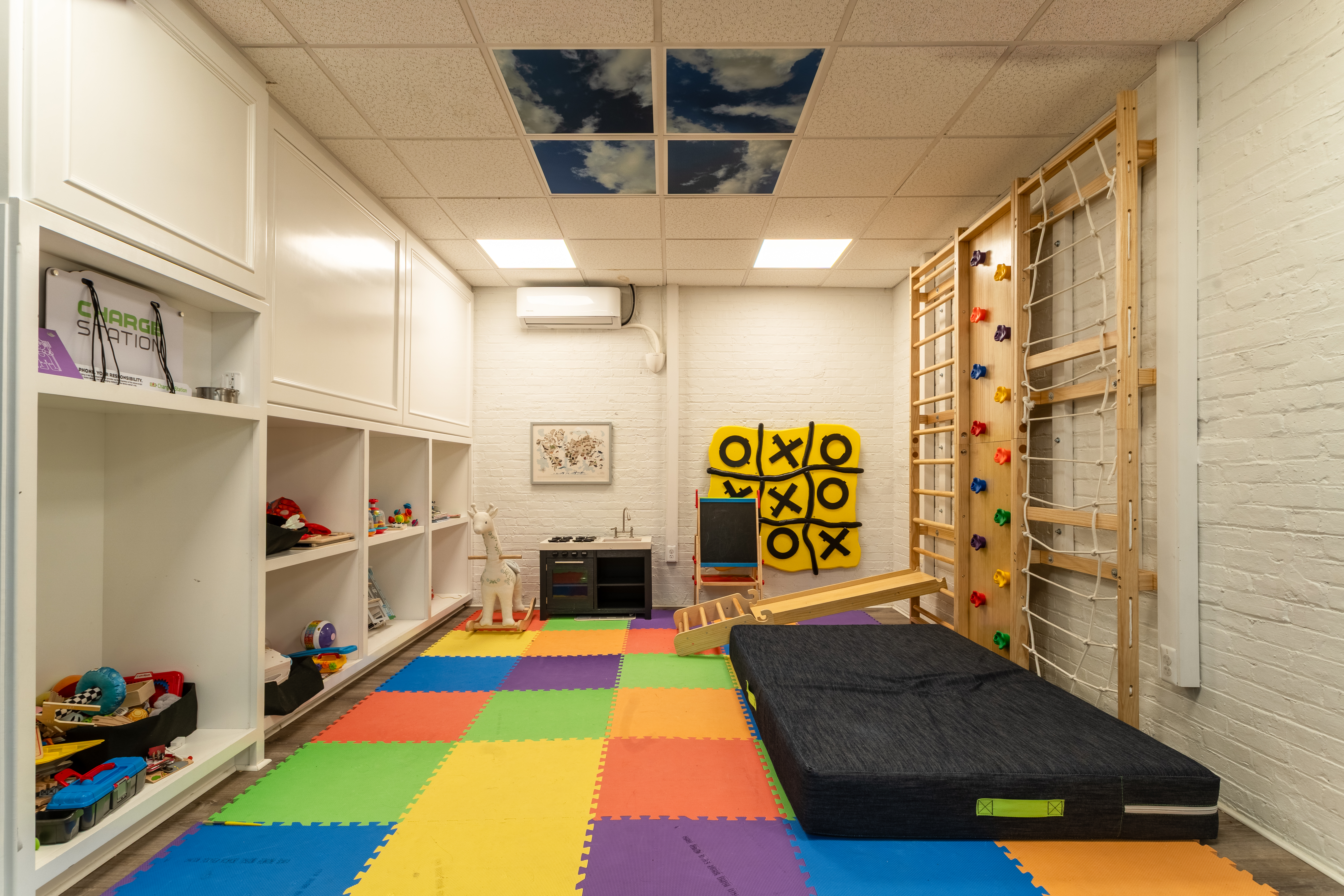 205 West 89th Street, Unit PH8 Manhattan, NY 10024 - Photo 12 of 15 a kitchen with stainless steel appliances granite countertop a sink and a refrigerator