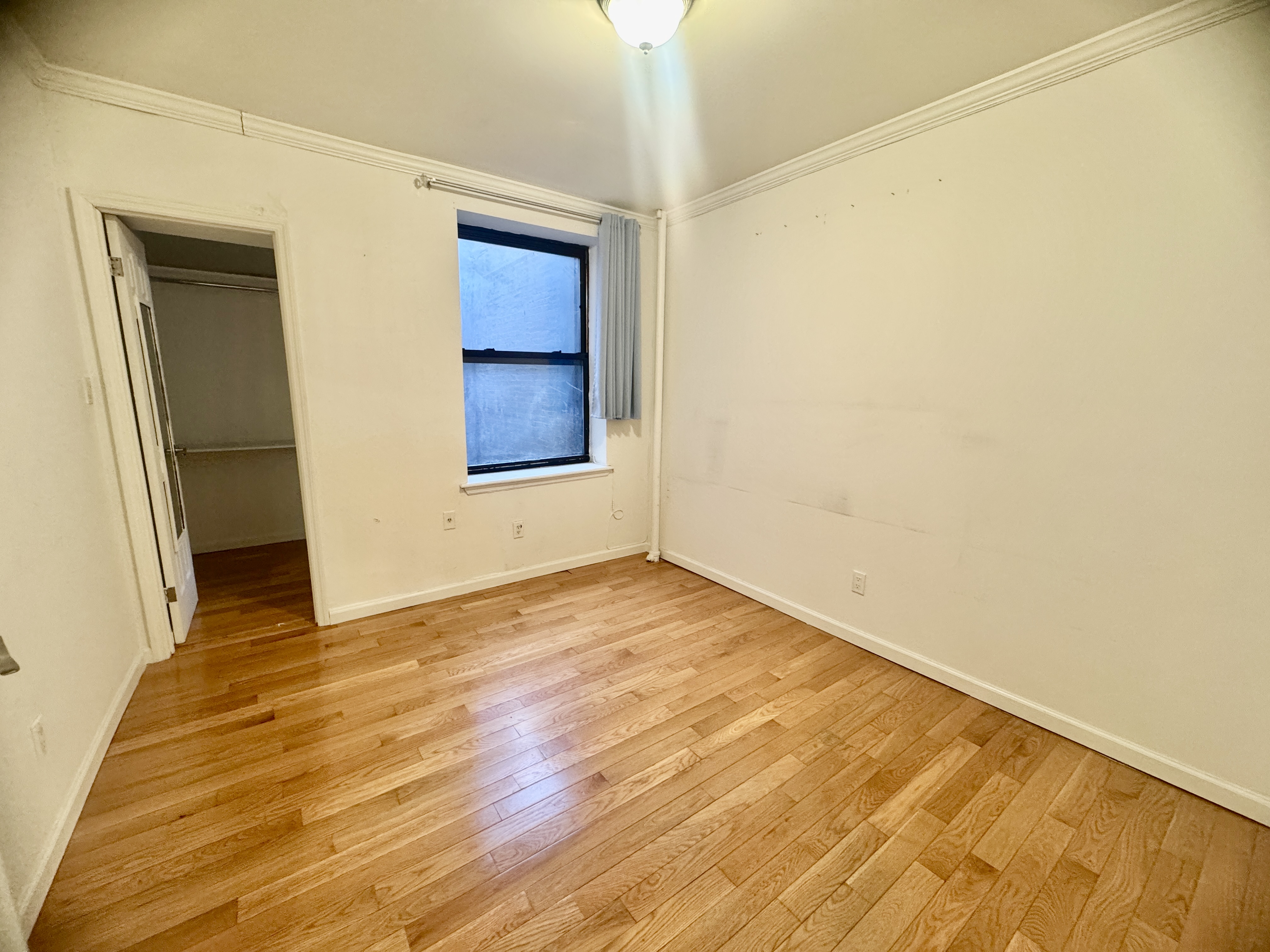 1773 1st Avenue, Unit 18 Manhattan, NY 10128 - Photo 6 of 10 a view of an empty room