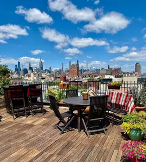 a view of a terrace with seating area