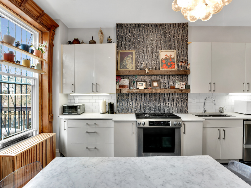 1124 Prospect Place, Unit PLEX Brooklyn, NY 11213 - Photo 3 of 15 a kitchen with a stove top oven sink and cabinets