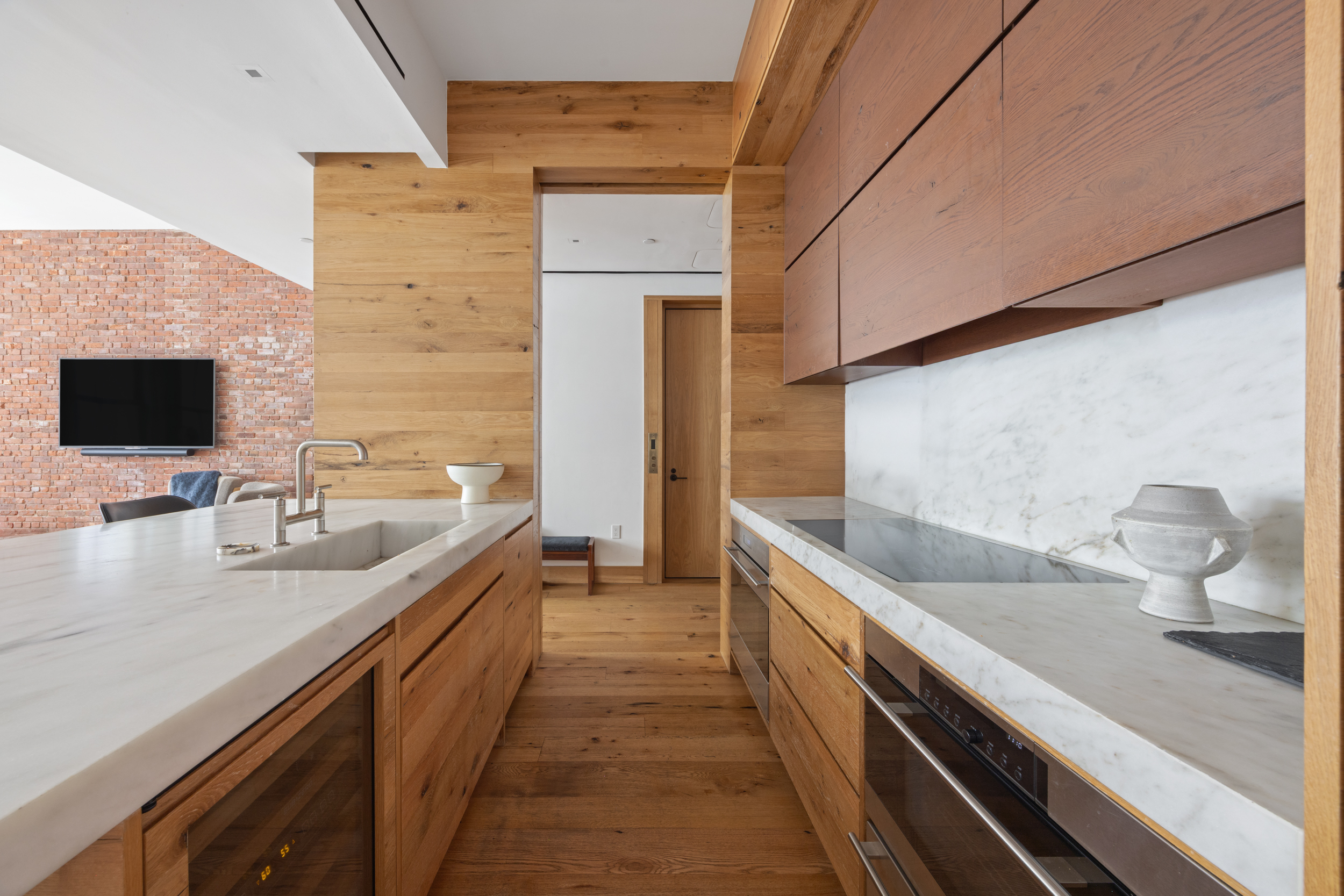 60 White Street, Unit 4E Manhattan, NY 10013 - Photo 8 of 19 a bathroom with a granite countertop sink a toilet and mirror