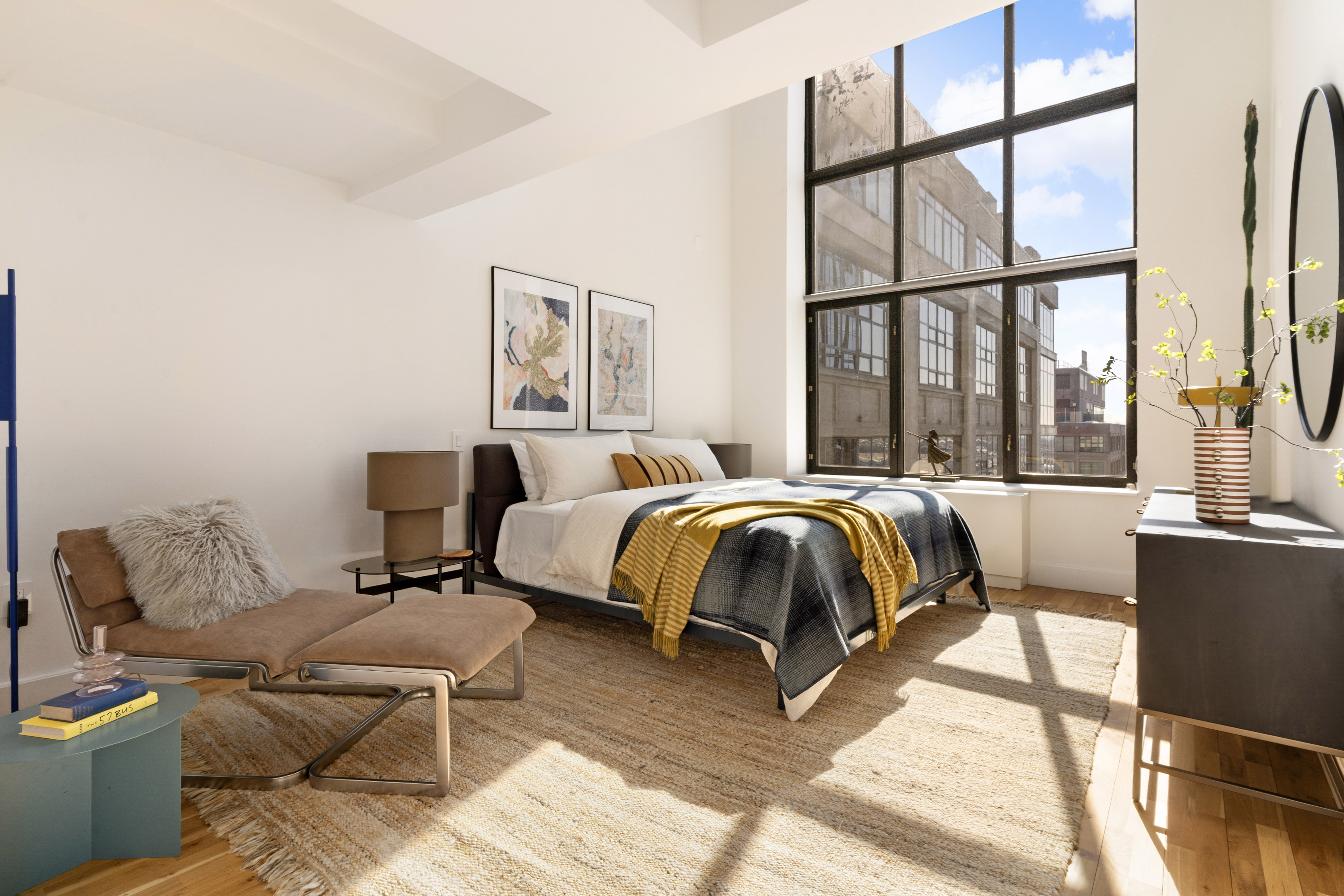 360 Furman Street, Unit 1041/1042 Brooklyn, NY 11201 - Photo 9 of 30 a bedroom with a bed and a large window