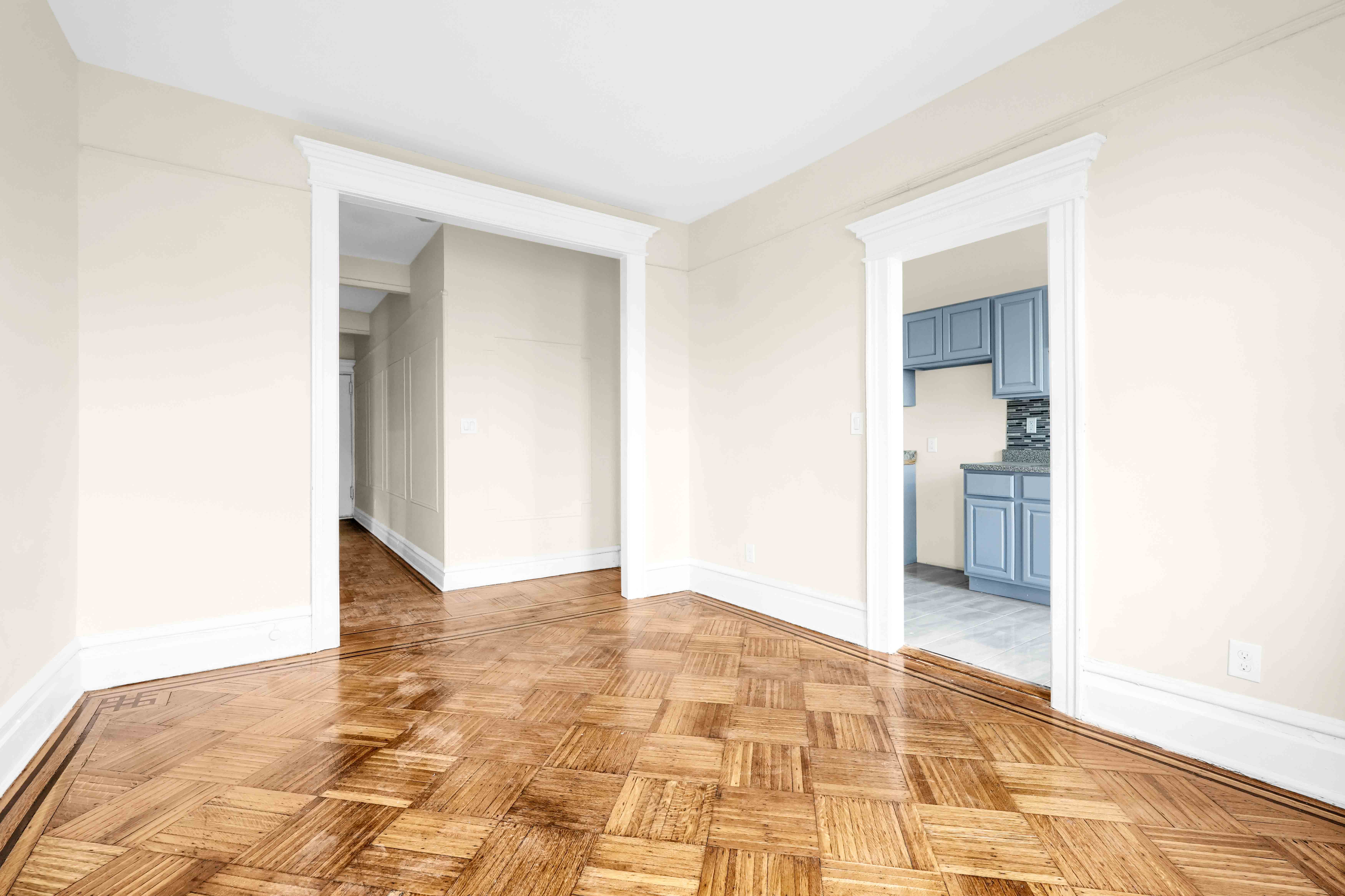 1770 Bedford Avenue Brooklyn, NY 11225 - Photo 35 of 50 a view of a hallway with wooden floor