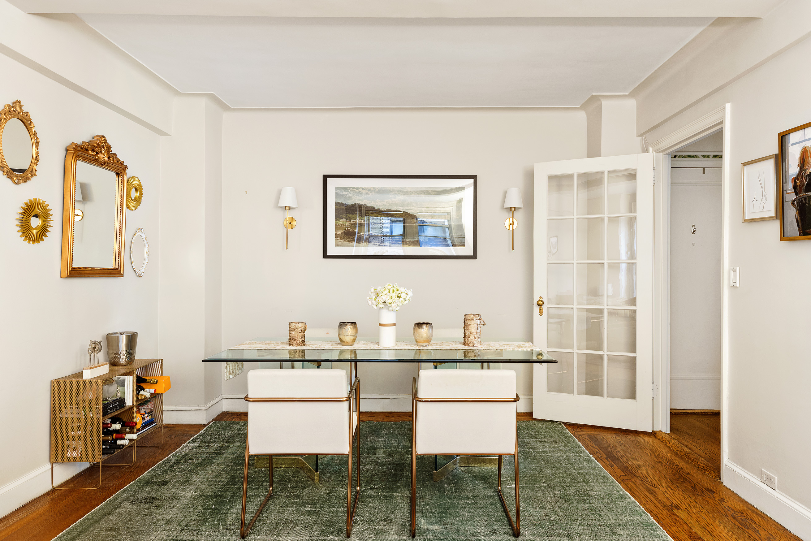308 East 79th Street, Unit 4K Manhattan, NY 10075 - Photo 2 of 11 a dining room with furniture and window