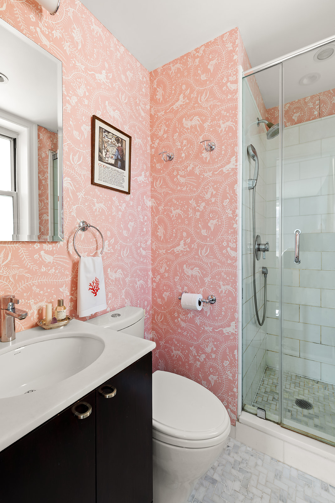 30 East 9th Street, Unit 5LL Manhattan, NY 10003 - Photo 6 of 10 a bathroom with a sink toilet and shower