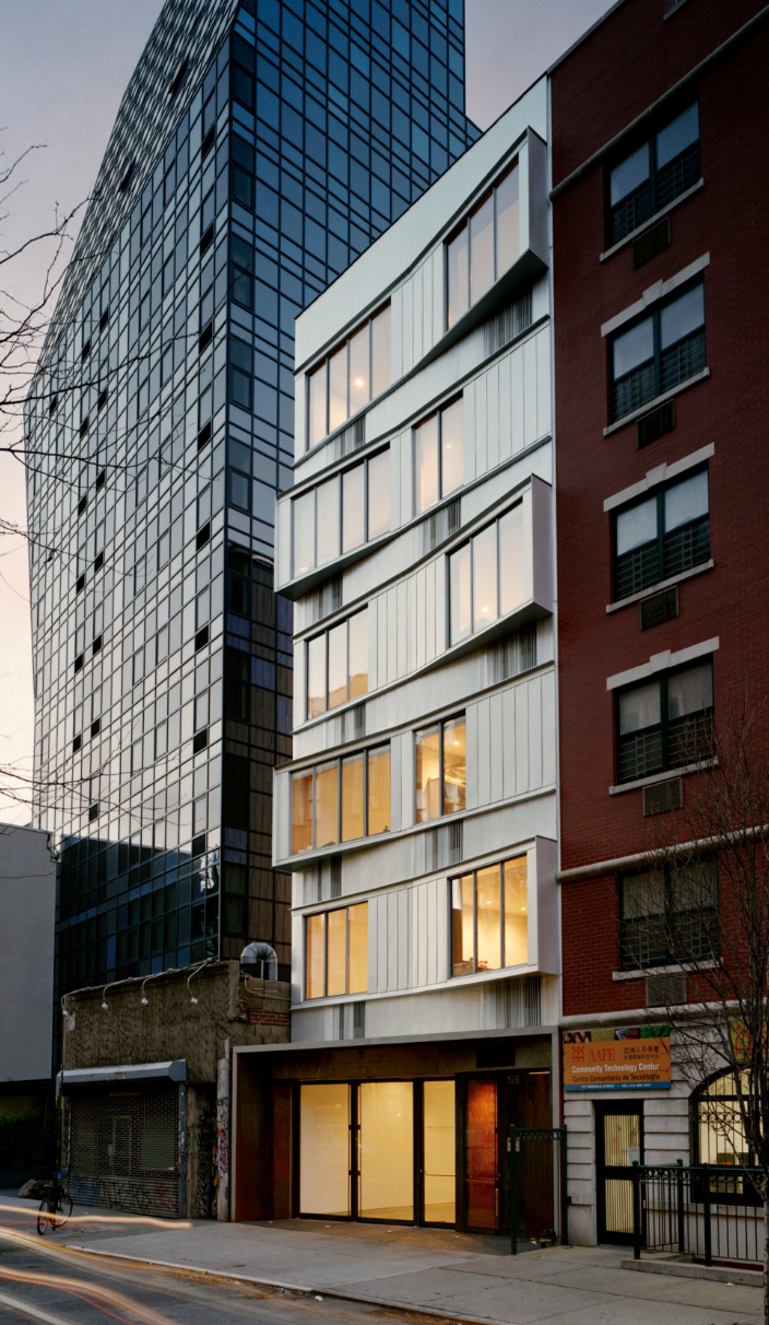 109 Norfolk Street, Unit 5 Manhattan, NY 10002 - Photo 11 of 14 a front view of a building with glass windows