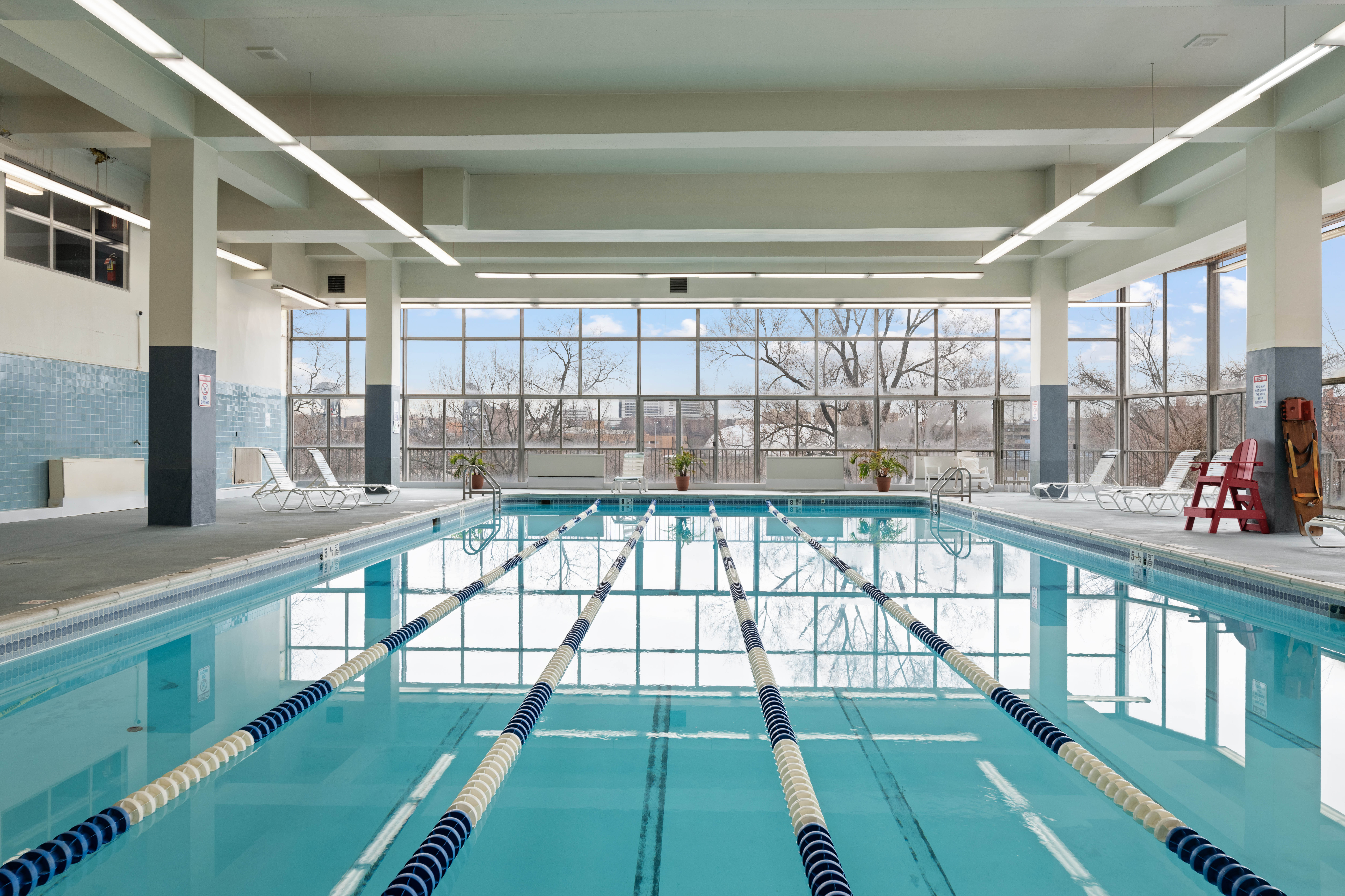 2500 Johnson Avenue, Unit 5E Bronx, NY 10463 - Photo 10 of 12 a view of an empty room with a floor to ceiling window and wooden floor