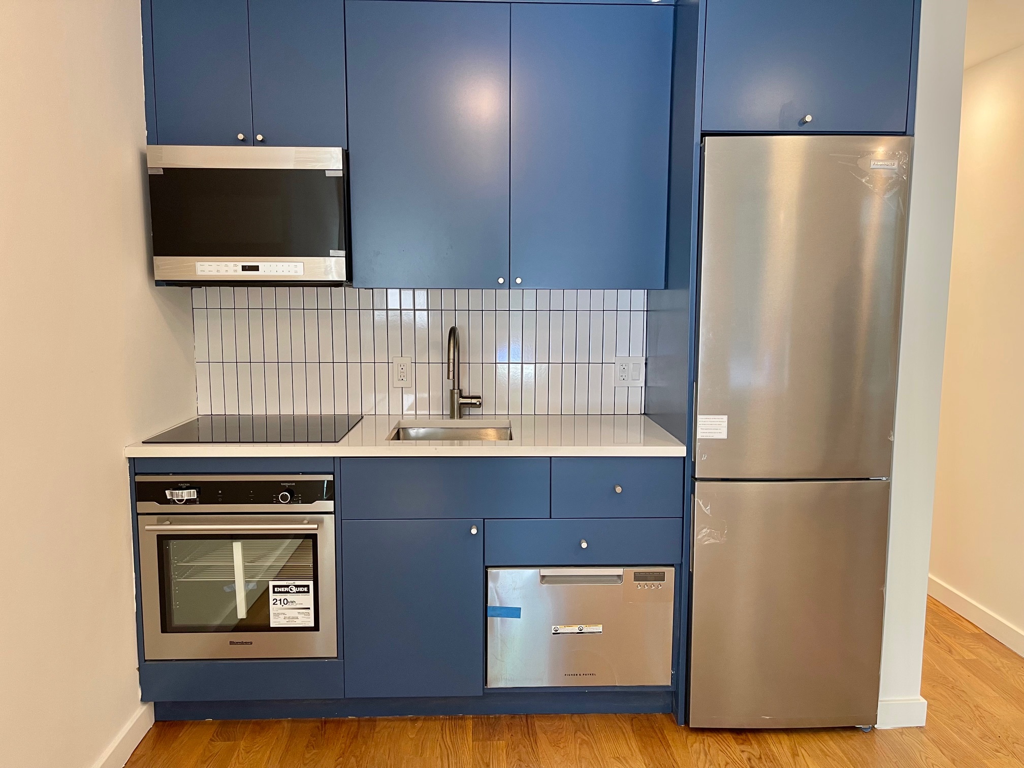 978 Bergen Street, Unit GARDEN Brooklyn, NY 11216 - Photo 9 of 15 a kitchen with stainless steel appliances a stove and a refrigerator
