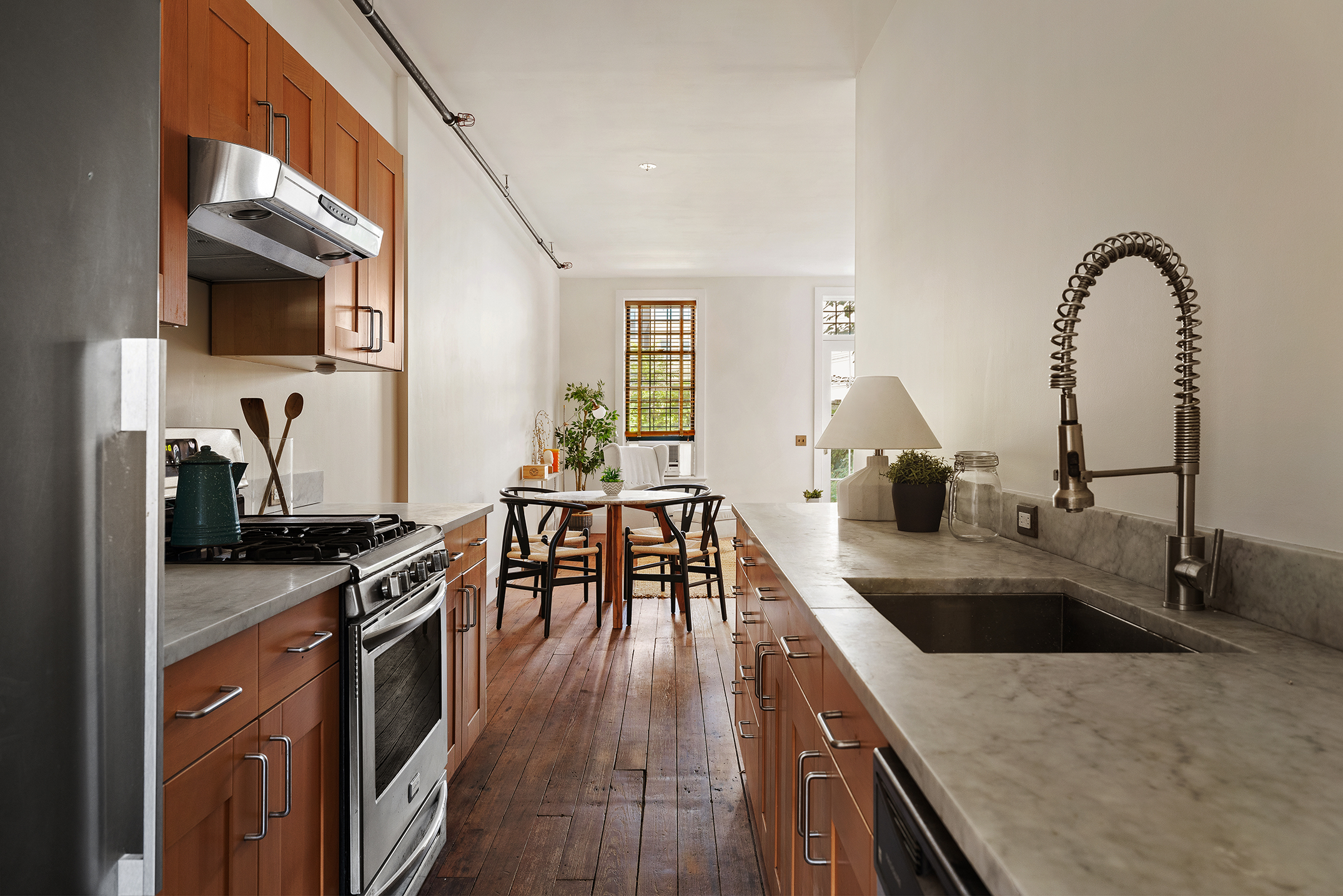 164 Coffey Street Brooklyn, NY 11231 - Photo 27 of 31 a kitchen with stainless steel appliances granite countertop a sink stove and cabinets