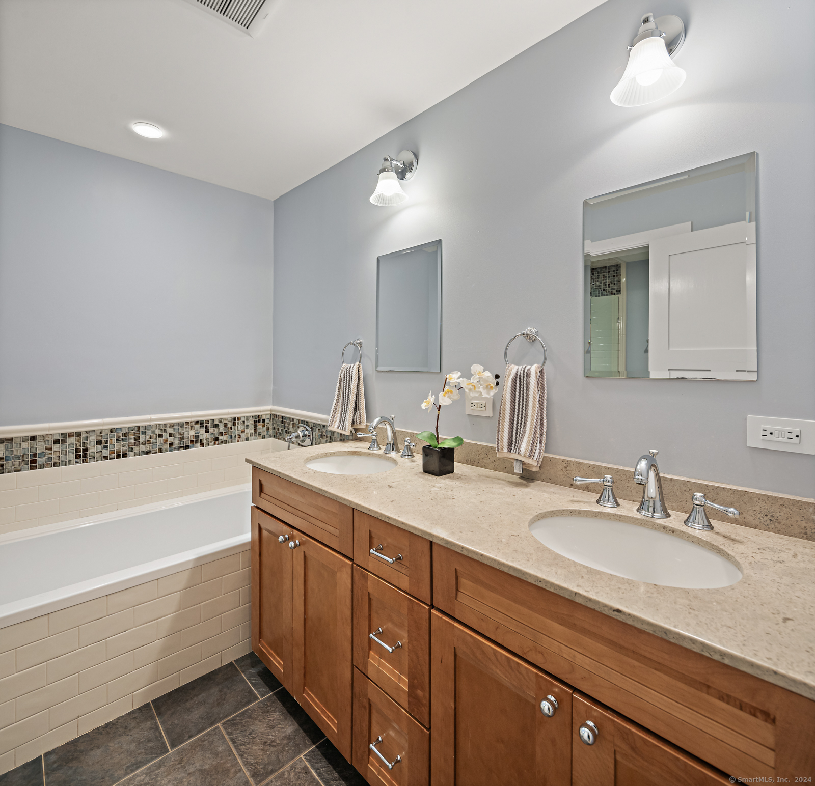 13 Bittersweet Road Weston, CT 06883 - Photo 21 of 35 a bathroom with a granite countertop sink mirror and bathtub