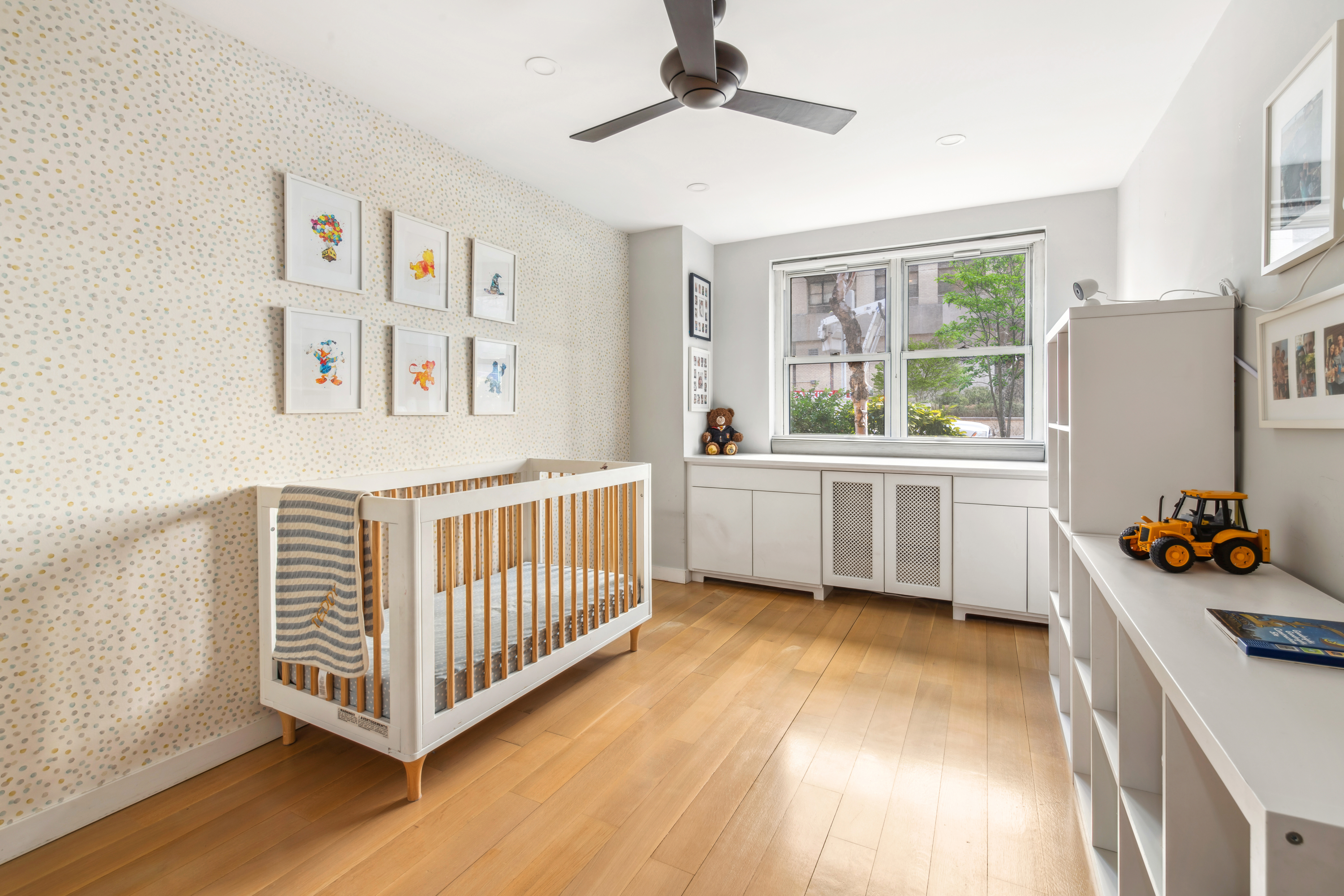 340 East 80th Street, Unit 1D Manhattan, NY 10075 - Photo 9 of 15 a bedroom with a bed and a window