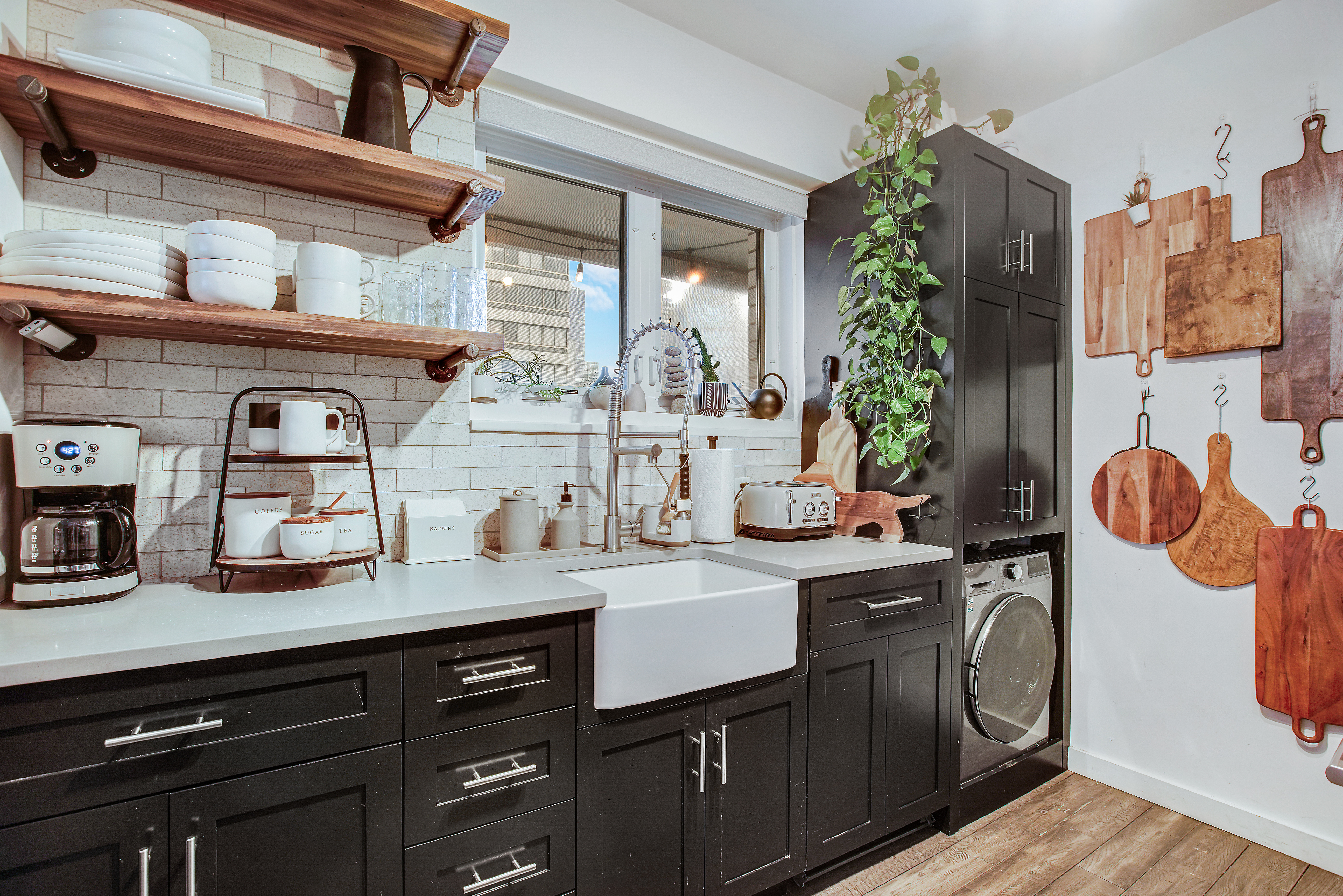 175 East 62nd Street, Unit 18B Manhattan, NY 10065 - Photo 8 of 18 a kitchen with a sink and a stove