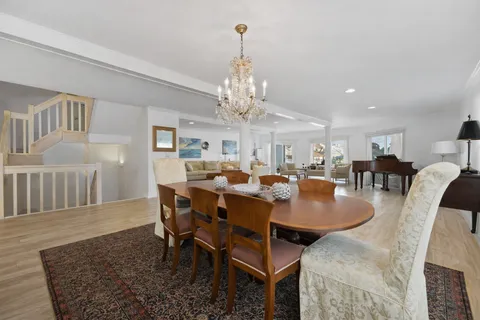a kitchen with granite countertop a sink and a counter top space
