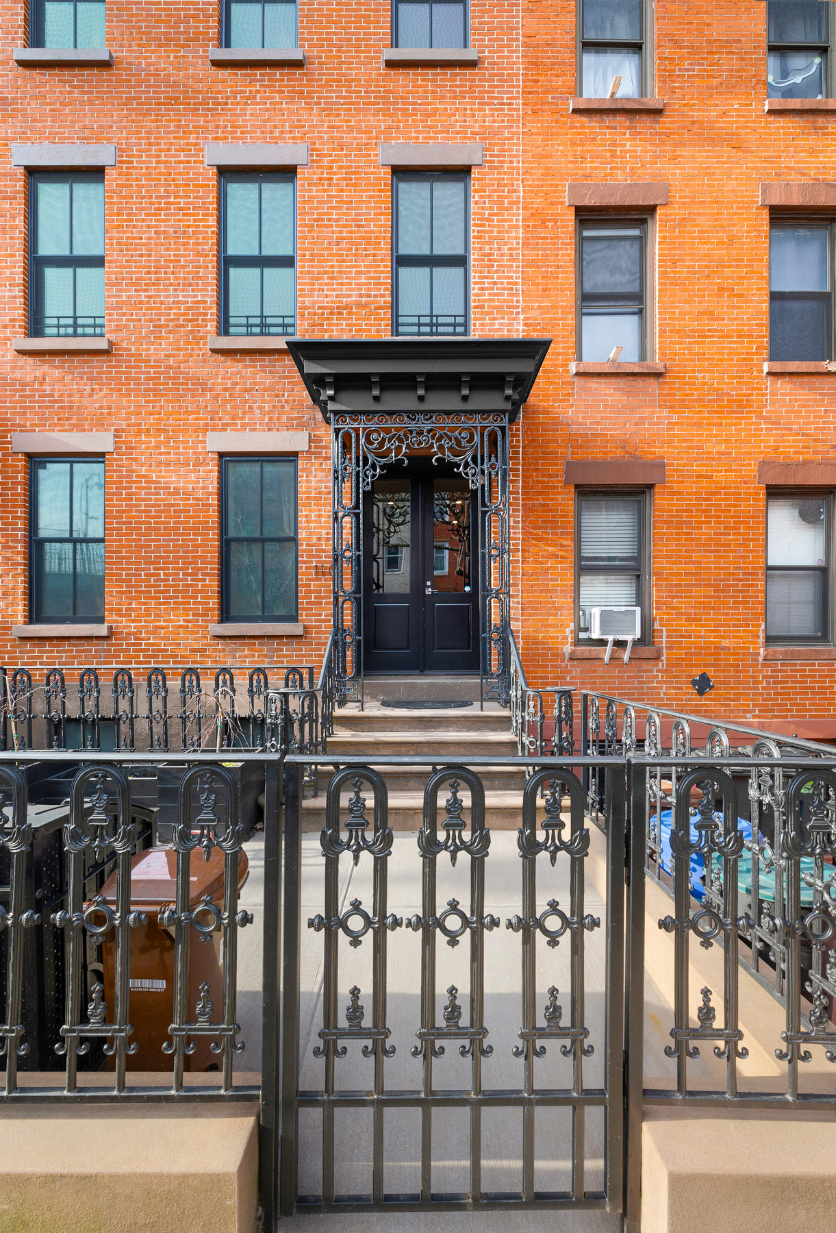 110 Summit Street, Unit 2 Brooklyn, NY 11231 - Photo 12 of 13 a front view of a building with glass windows
