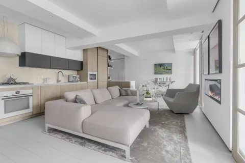 a living room with furniture and a couch