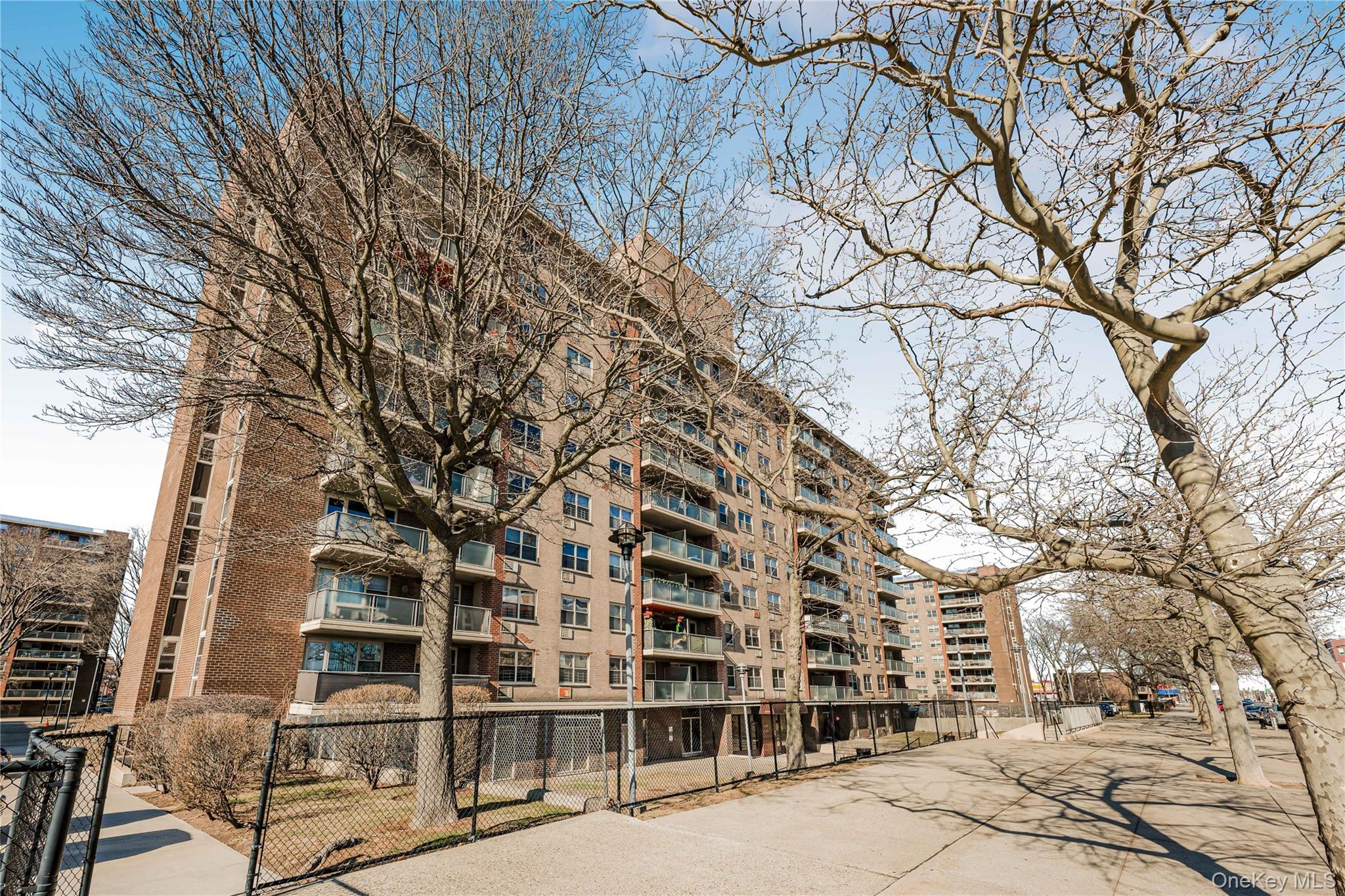 12399 Flatlands Avenue, Unit 1L Brooklyn, NY 11207 - Photo 18 of 21 front view of a large building