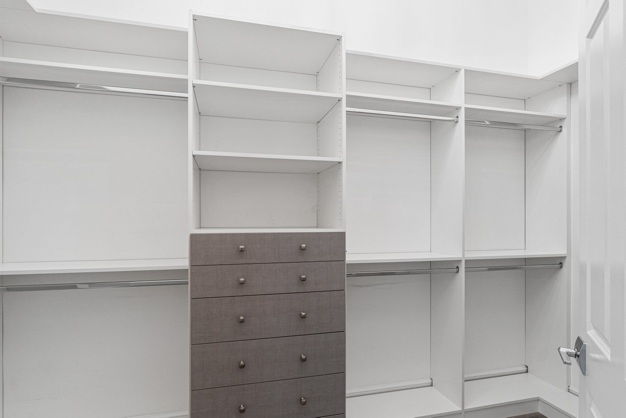 17352 Rosella Road Boca Raton, FL 33496 - Photo 17 of 41 a view of an empty walk in closet