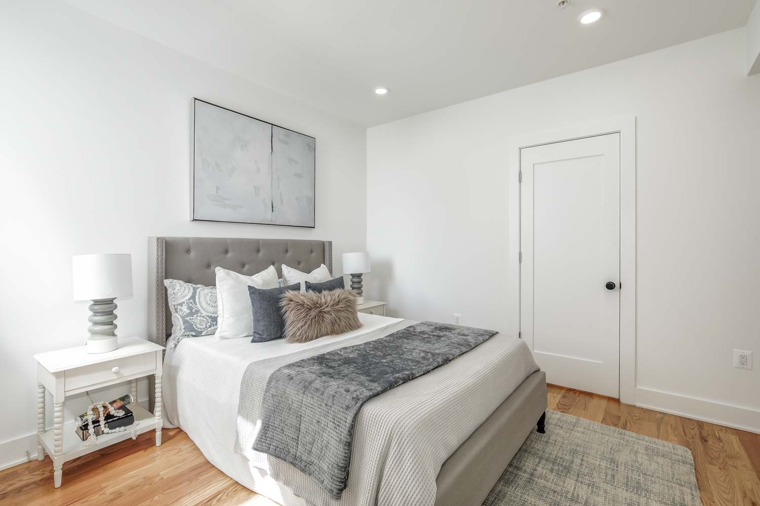 428 Manor Place Northwest, Unit 1 Washington, DC 20010 - Photo 14 of 27 a bedroom with a bed and a night stand