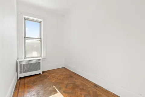 an empty room with a window