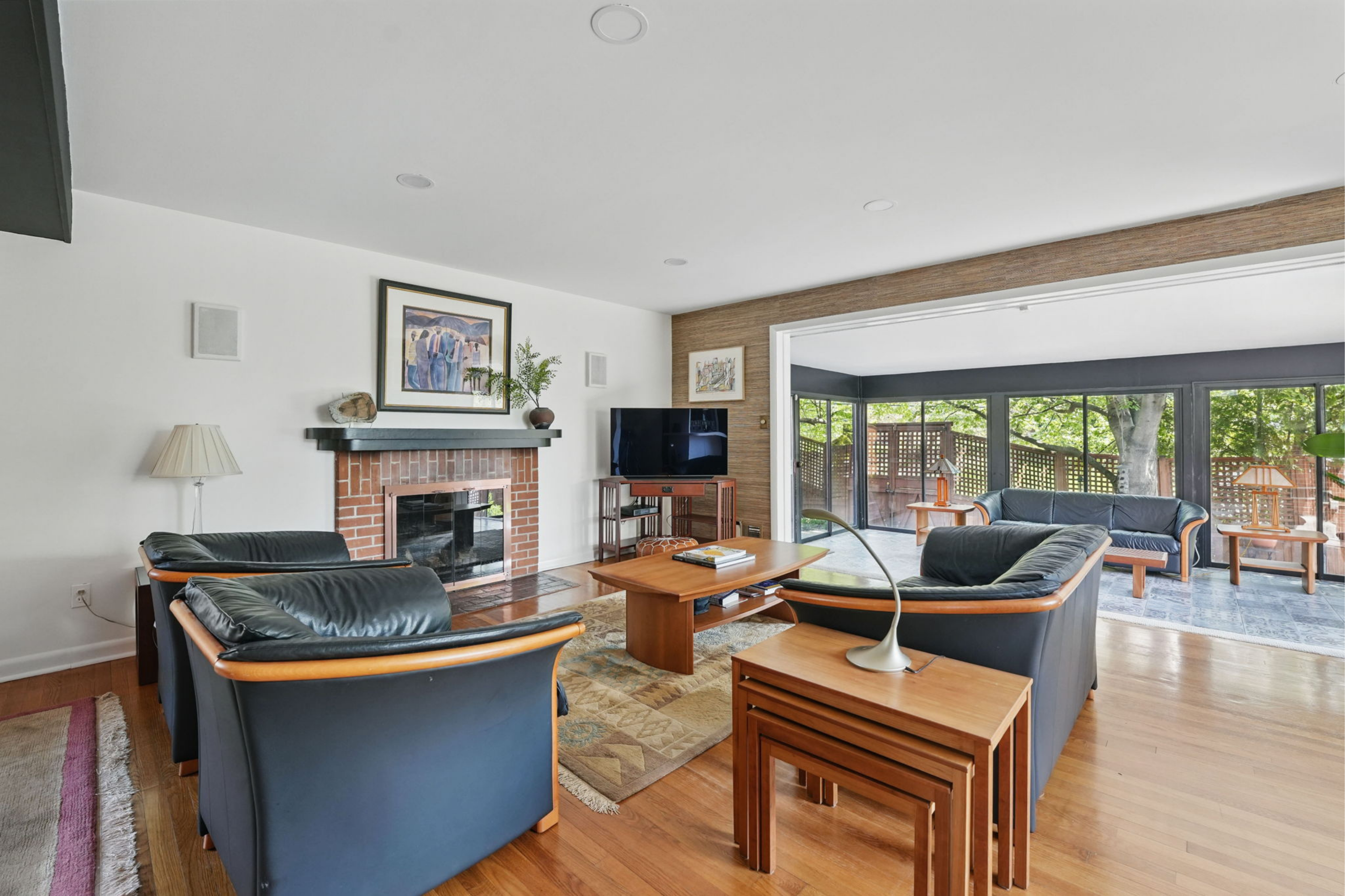 8003 16th Street Northwest Washington, DC 20012 - Photo 21 of 38 a living room with fireplace furniture and a large window