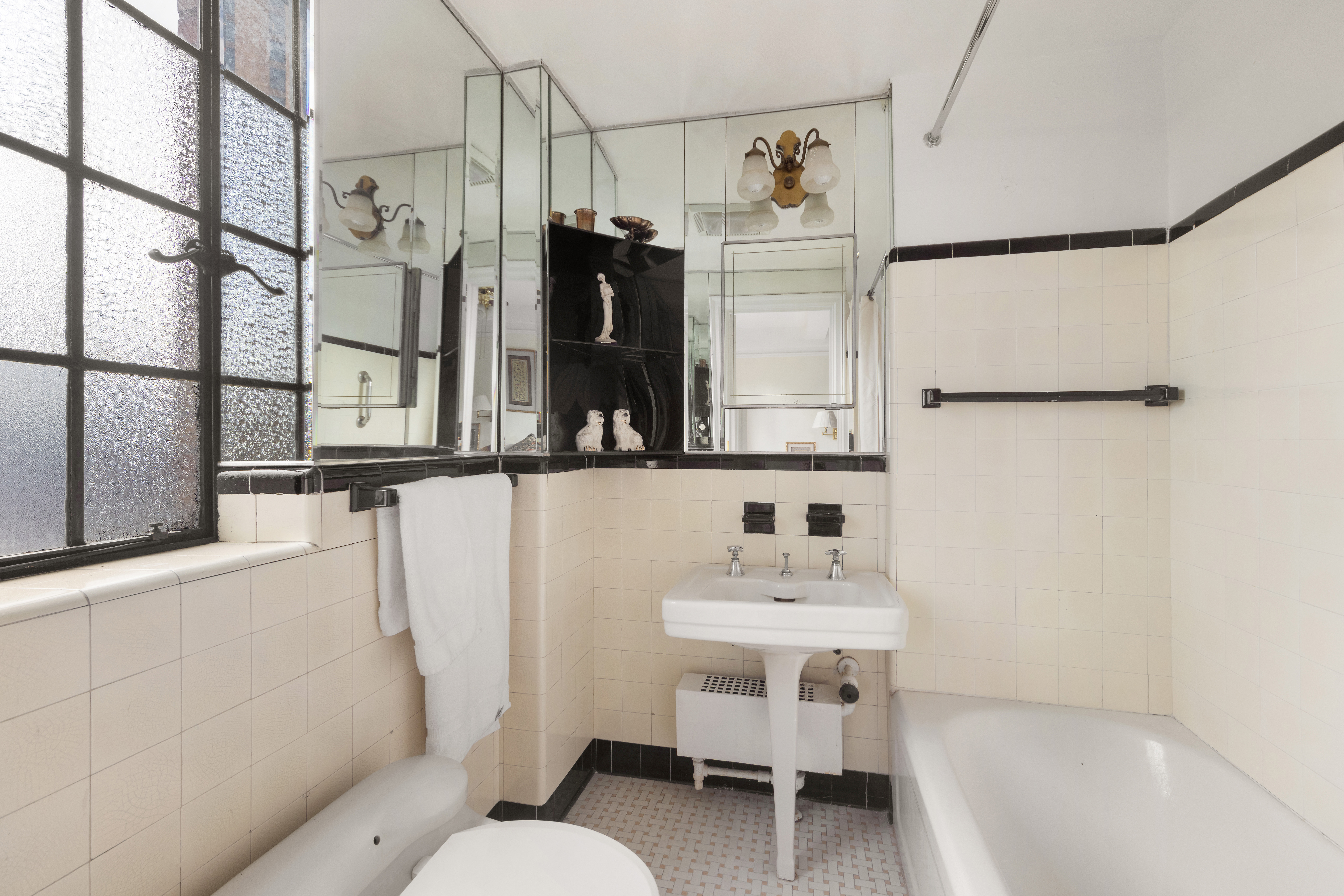 10 Park Avenue, Unit 26A Manhattan, NY 10016 - Photo 7 of 10 a bathroom with a sink toilet and shower