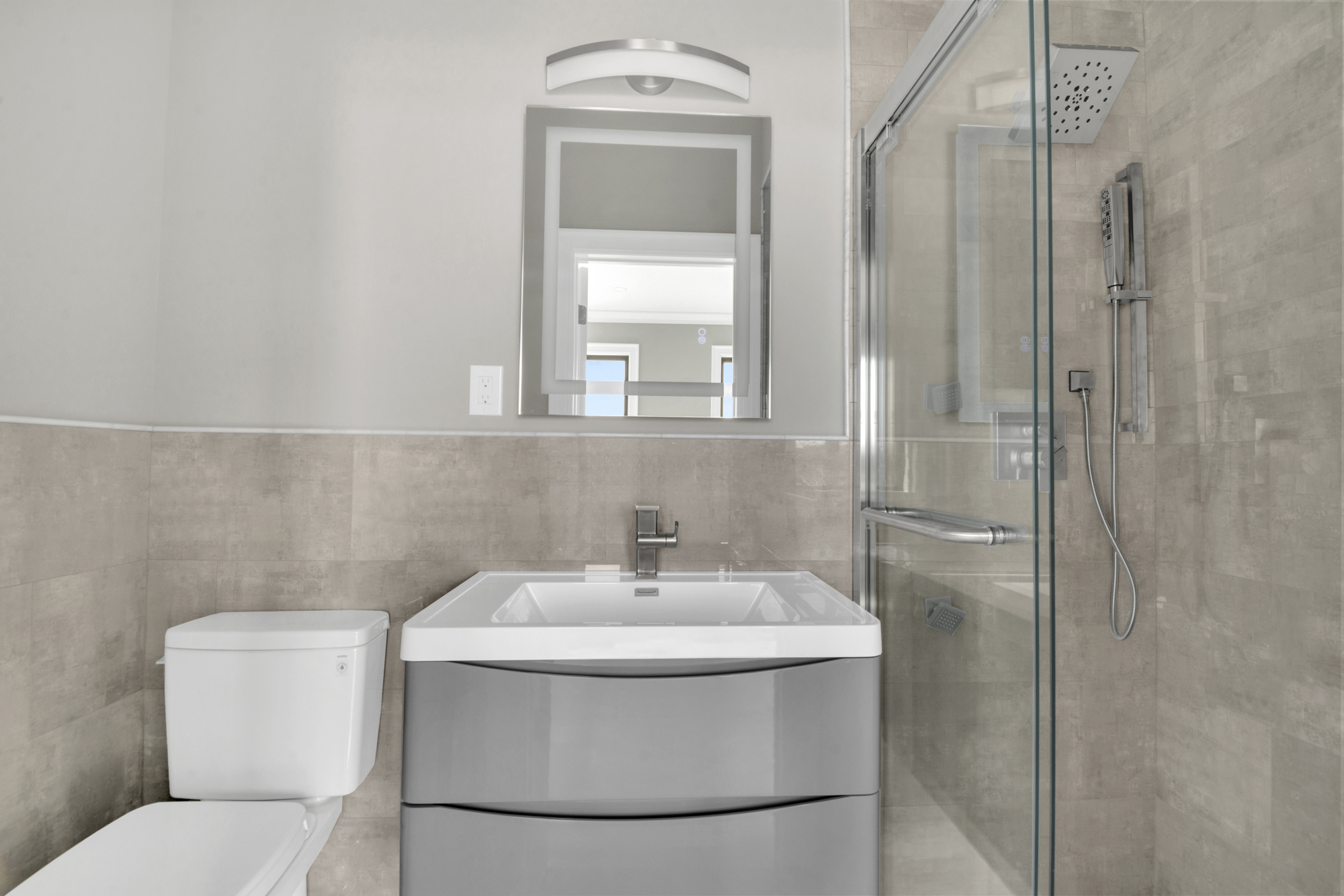 5 Osprey Court Staten Island, NY 10308 - Photo 32 of 50 a bathroom with a sink a toilet and shower