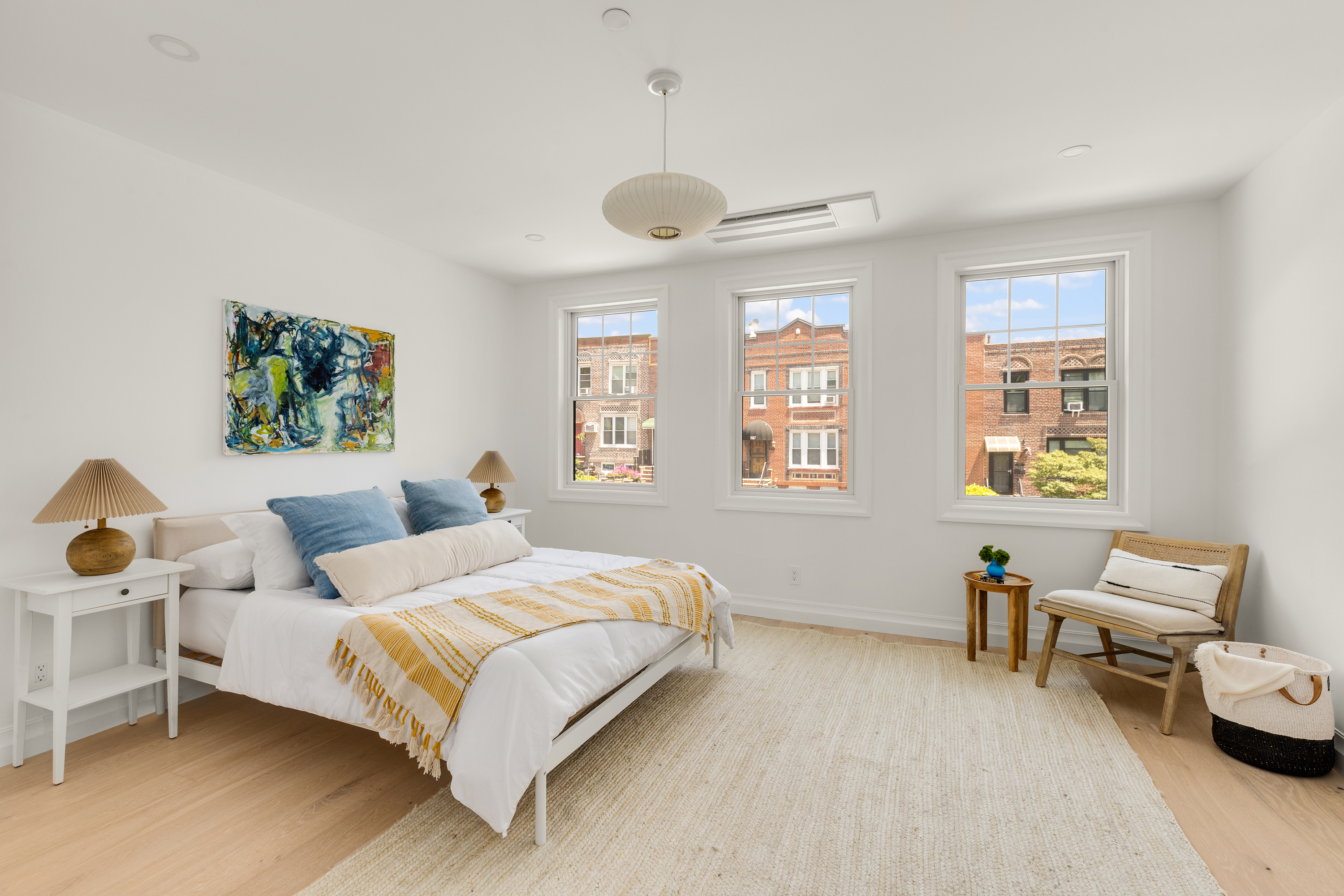 578 20th Street Brooklyn, NY 11218 - Photo 10 of 28 a bedroom with a bed and a window