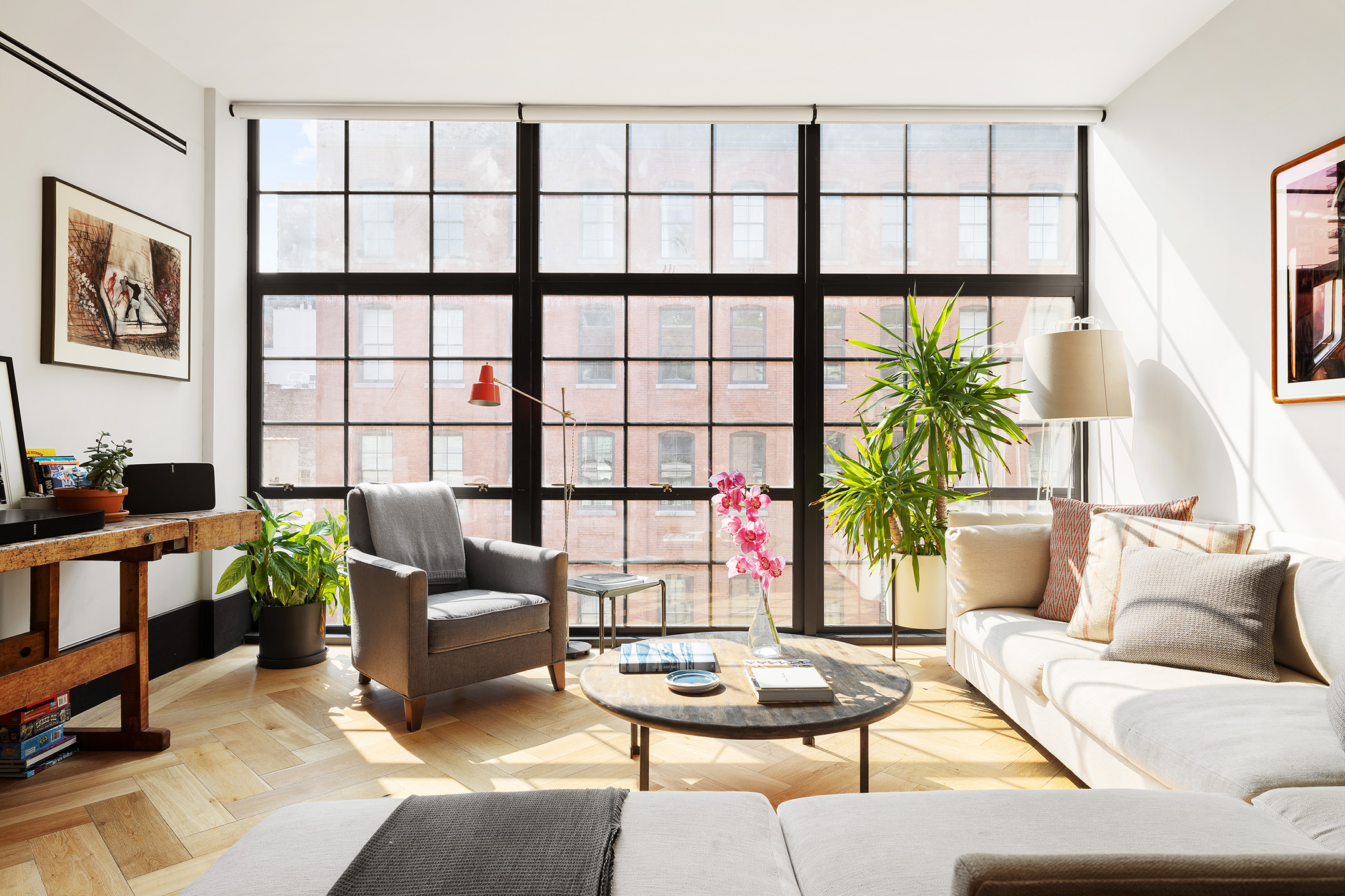a living room with furniture and a window