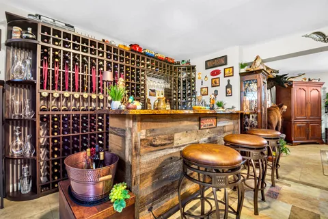 a view of a chairs and table in the patio