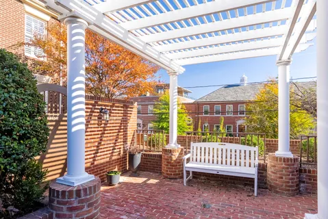 a view of a porch with a bench