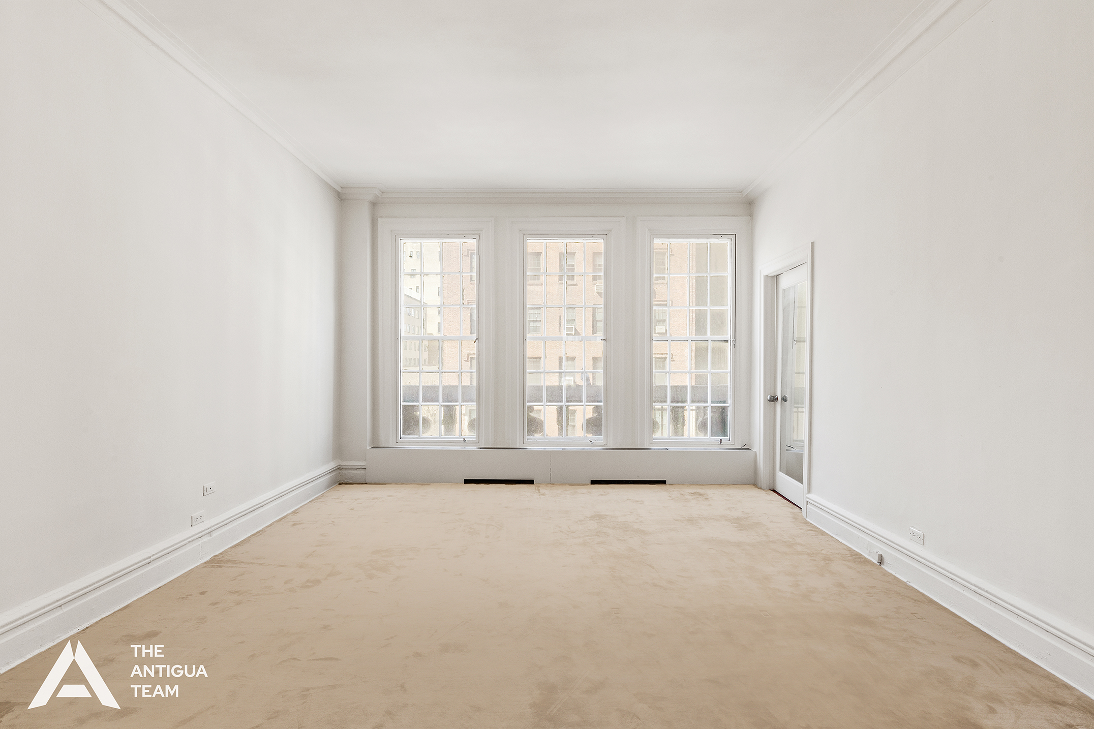 45 East 66th Street, Unit 4W Manhattan, NY 10065 - Photo 10 of 27 a view of an empty room with a window
