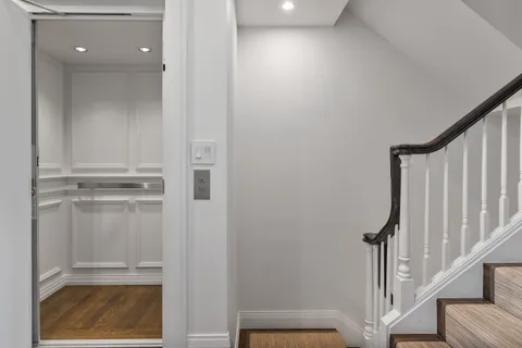 a view of entryway with wooden floor