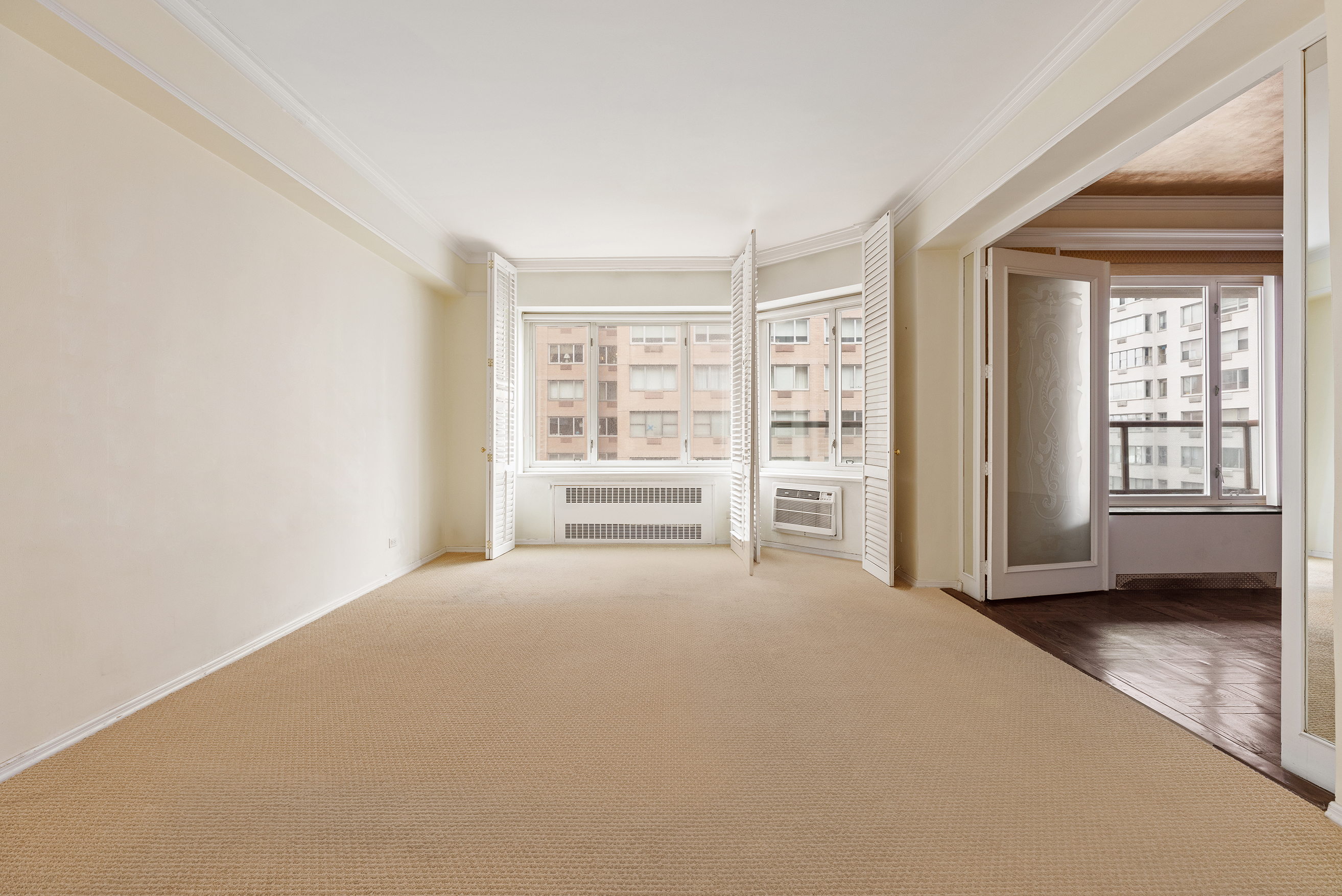 36 Sutton Place South, Unit 10B Manhattan, NY 10022 - Photo 9 of 16 a view of an empty room with a window