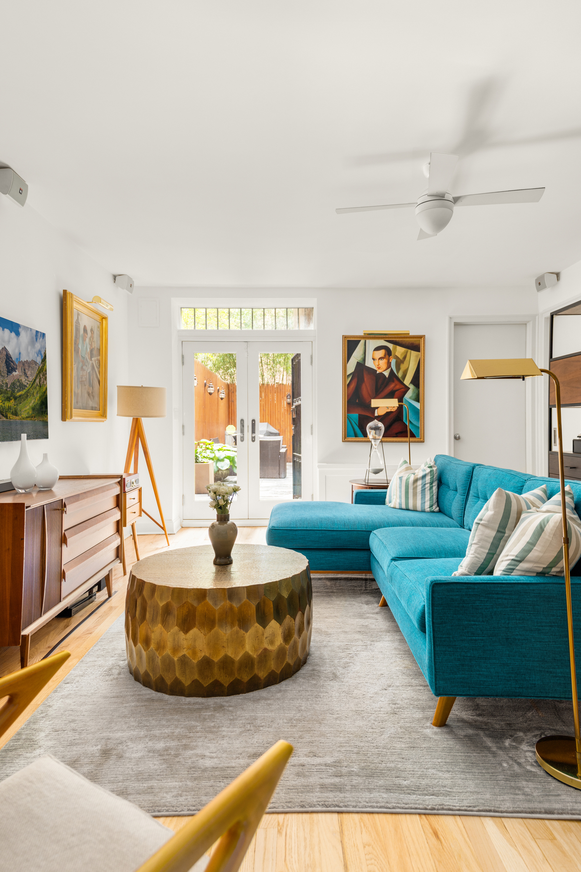 24 West 70th Street, Unit 1 Manhattan, NY 10023 - Photo 2 of 15 a living room with furniture and a large window