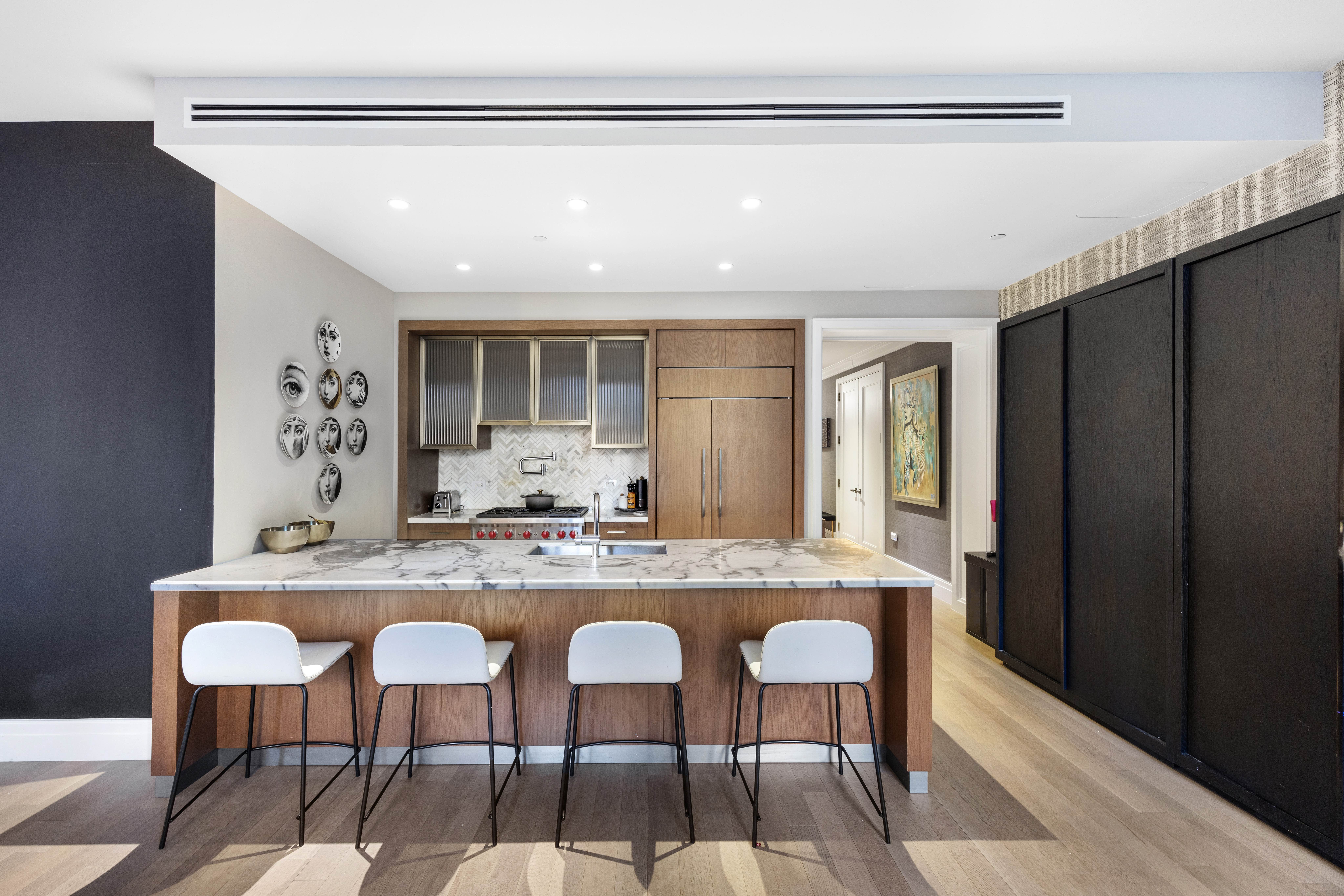 100 Barclay Street, Unit 16G Manhattan, NY 10007 - Photo 7 of 28 a dining table with chairs and painting on the wall