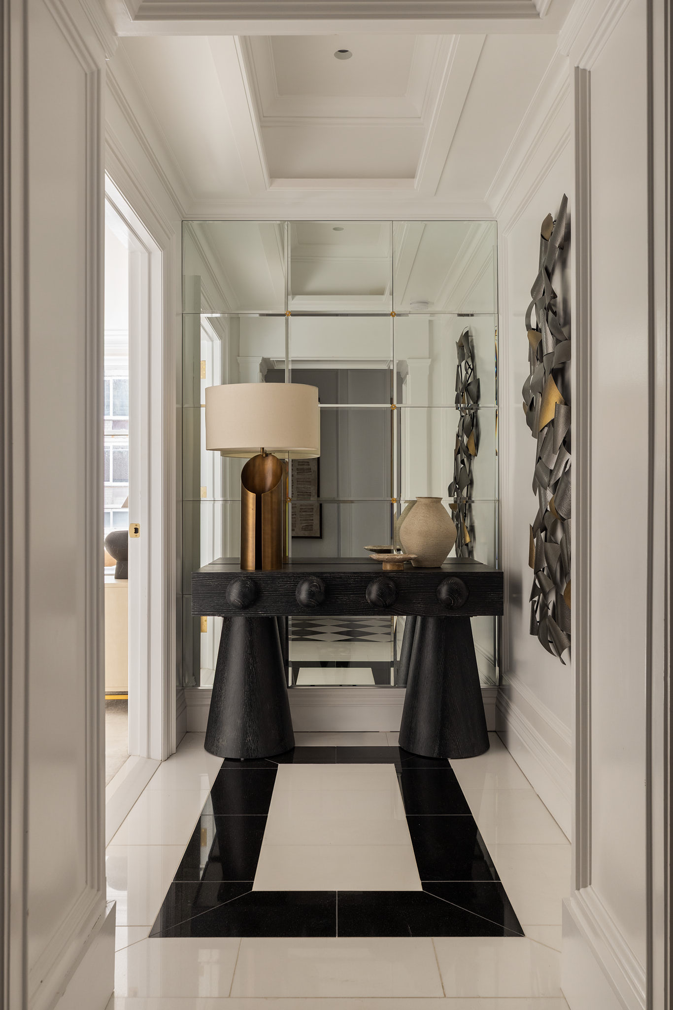350 East 57th Street, Unit 15B Manhattan, NY 10022 - Photo 14 of 20 a hallway with white cabinets and stainless steel appliances