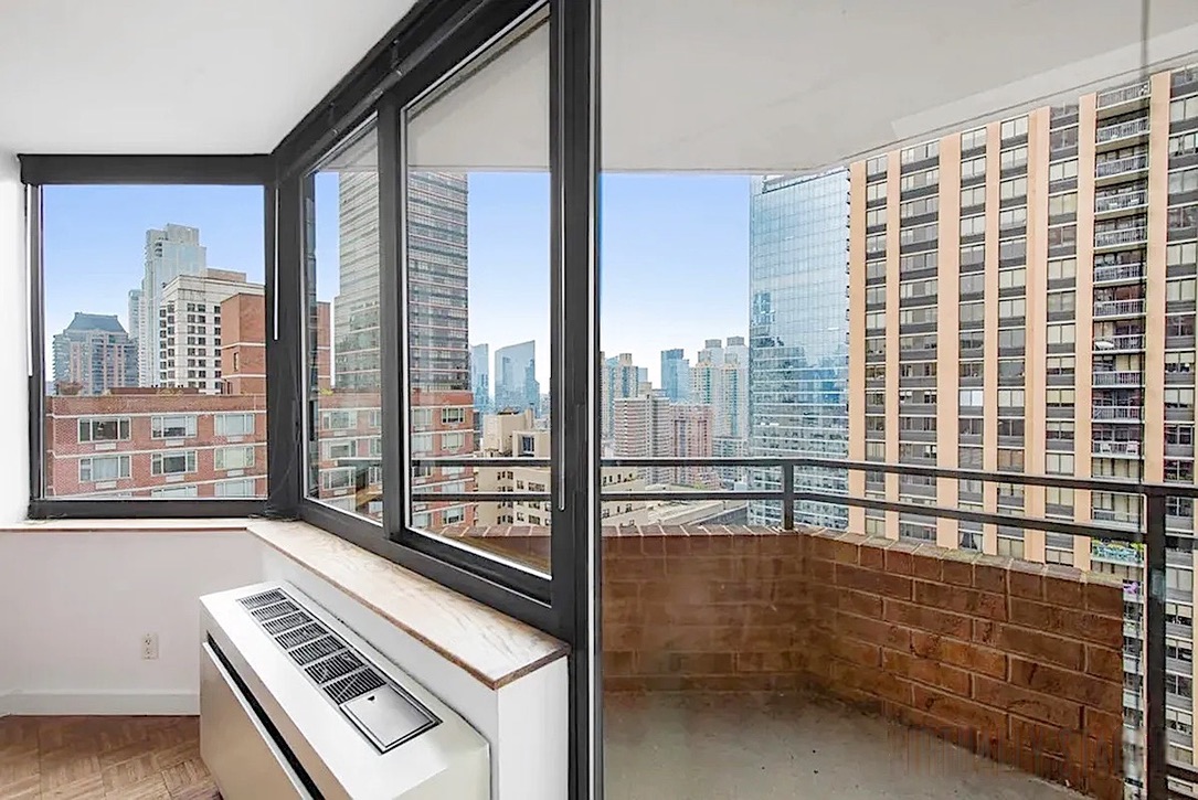 1991 Broadway, Unit 21C Manhattan, NY 10023 - Photo 5 of 6 a view of bathroom with a large window