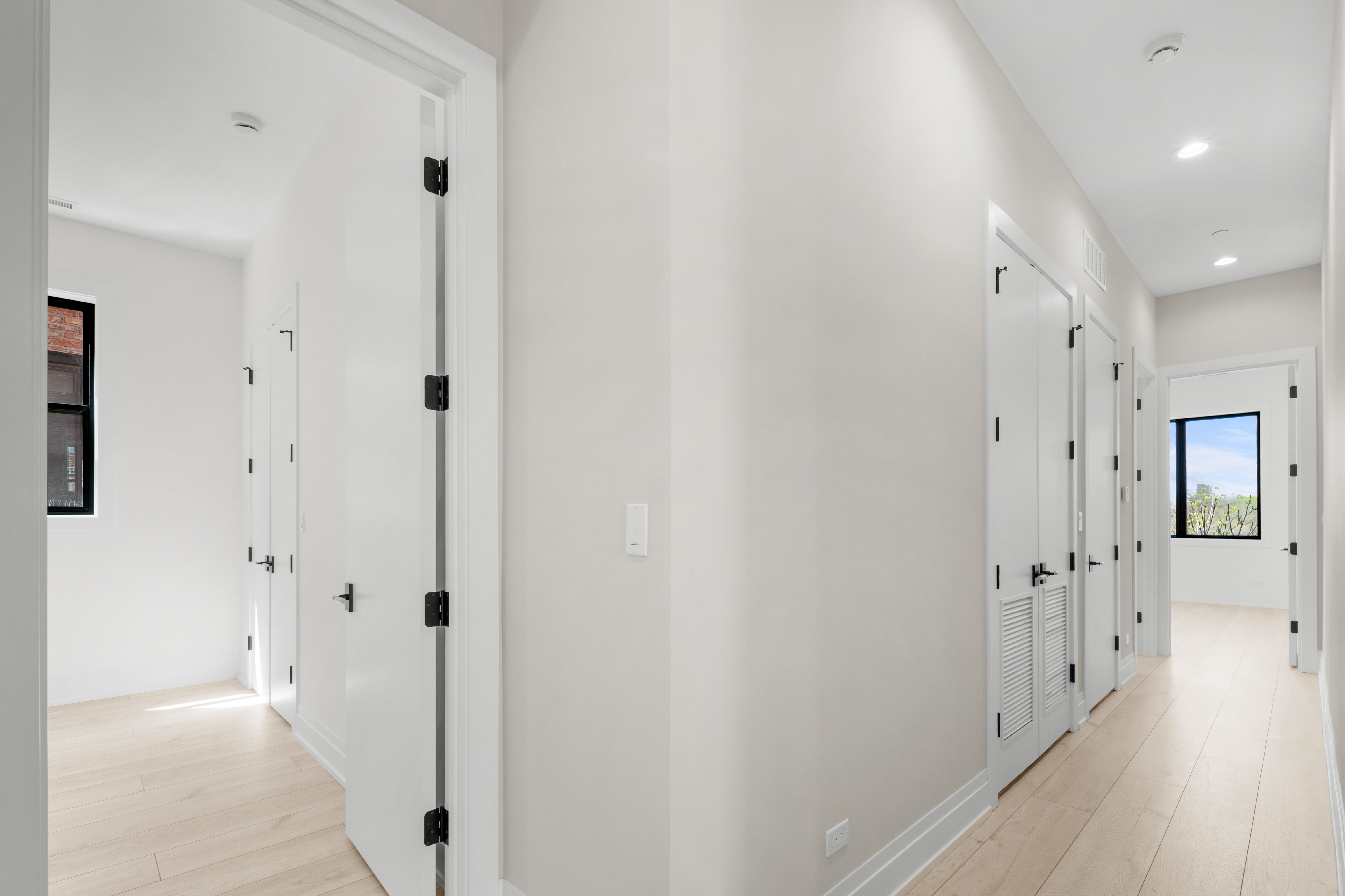 1327 West Taylor Street, Unit 4 Chicago, IL 60607 - Photo 15 of 27 a view of a hallway with wooden floor and closet area