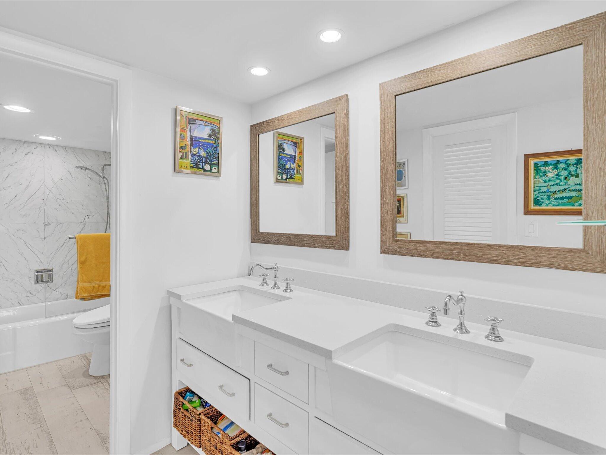 3000 South Ocean Boulevard, Unit 1504 Boca Raton, FL 33432 - Photo 28 of 64 a bathroom with a sink mirror vanity and toilet