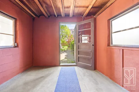 a view of hallway with a front door